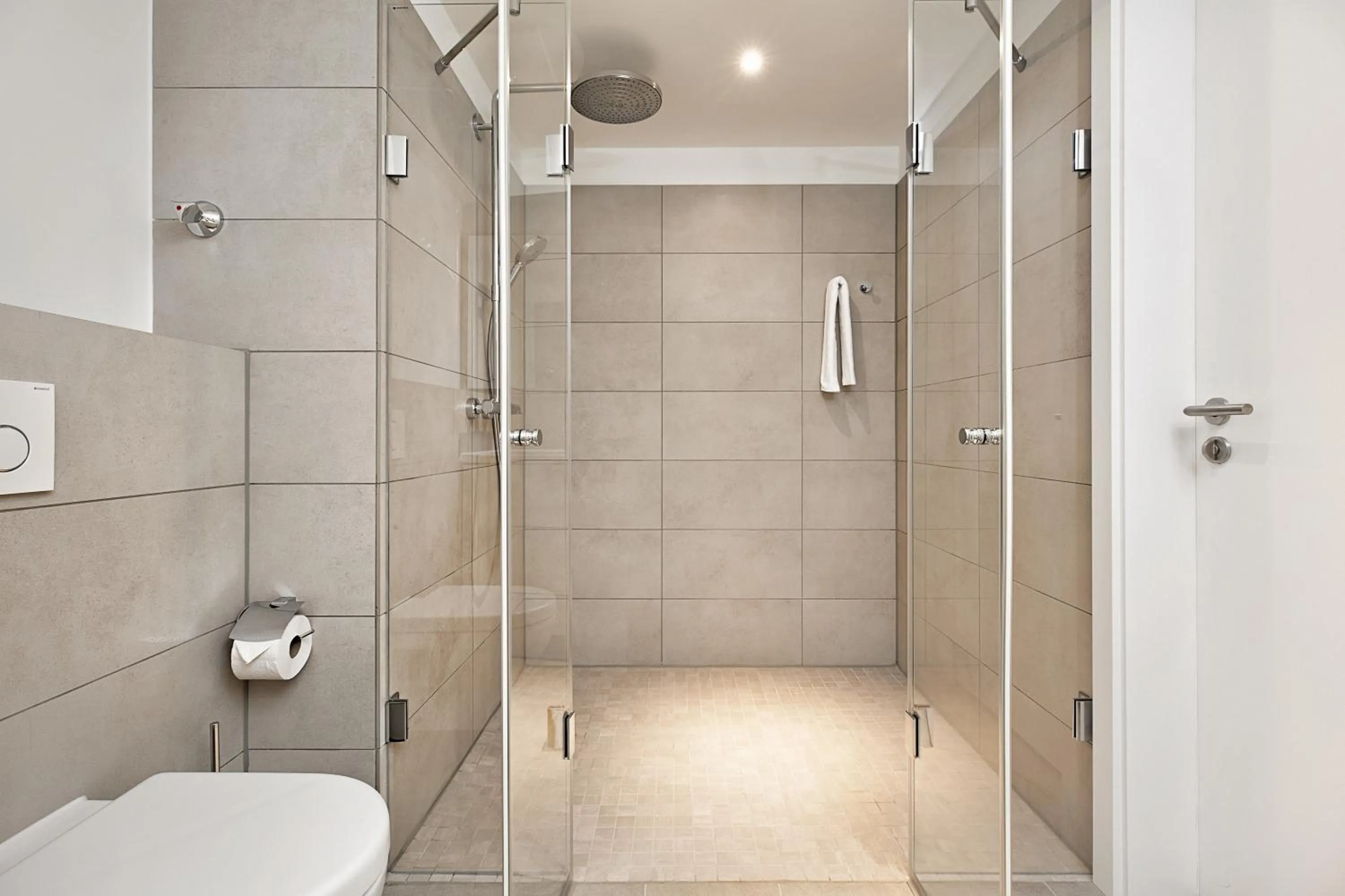 Shower in H.ome Serviced Apartments München