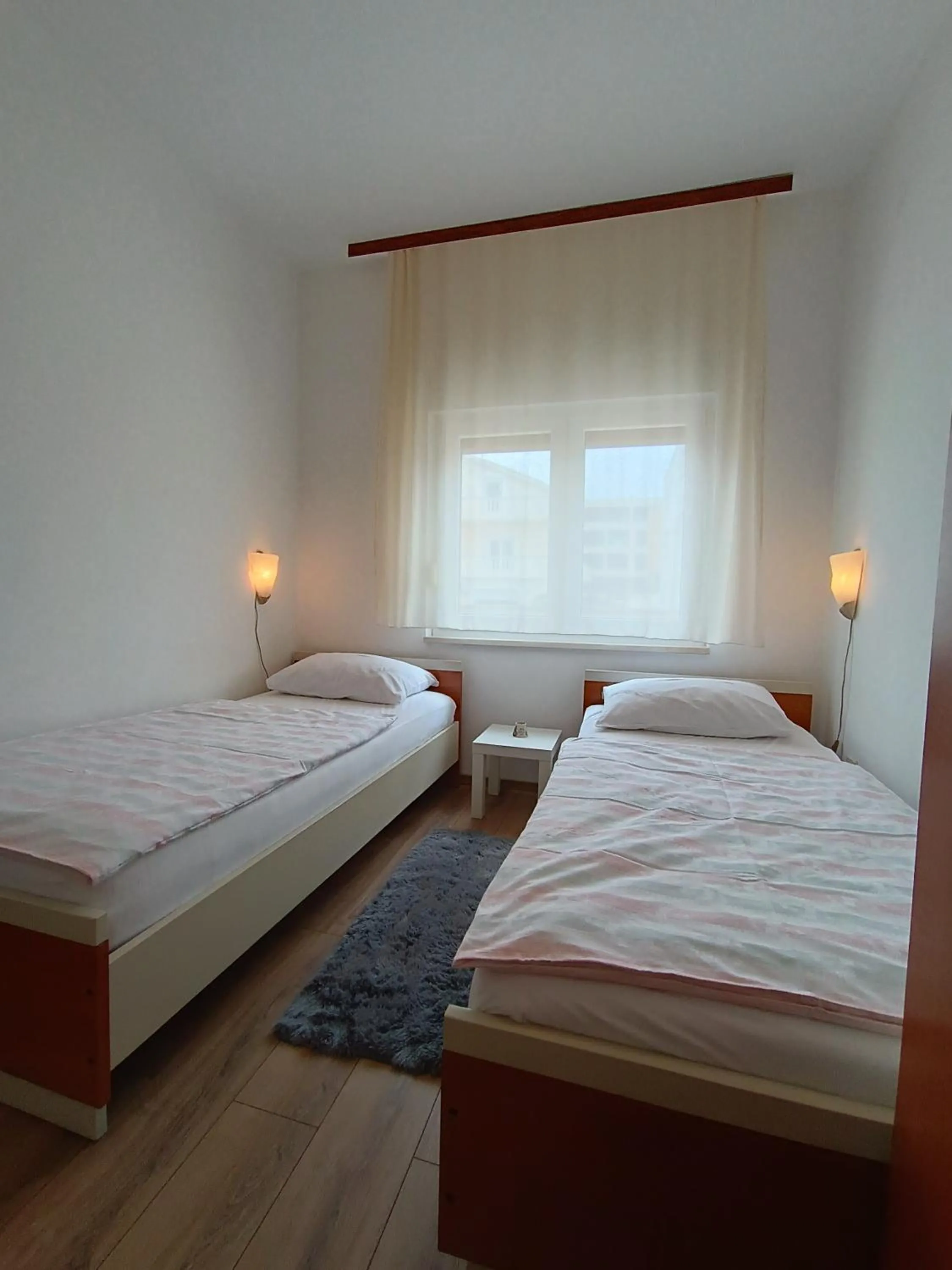 Bed in Apartments Mima