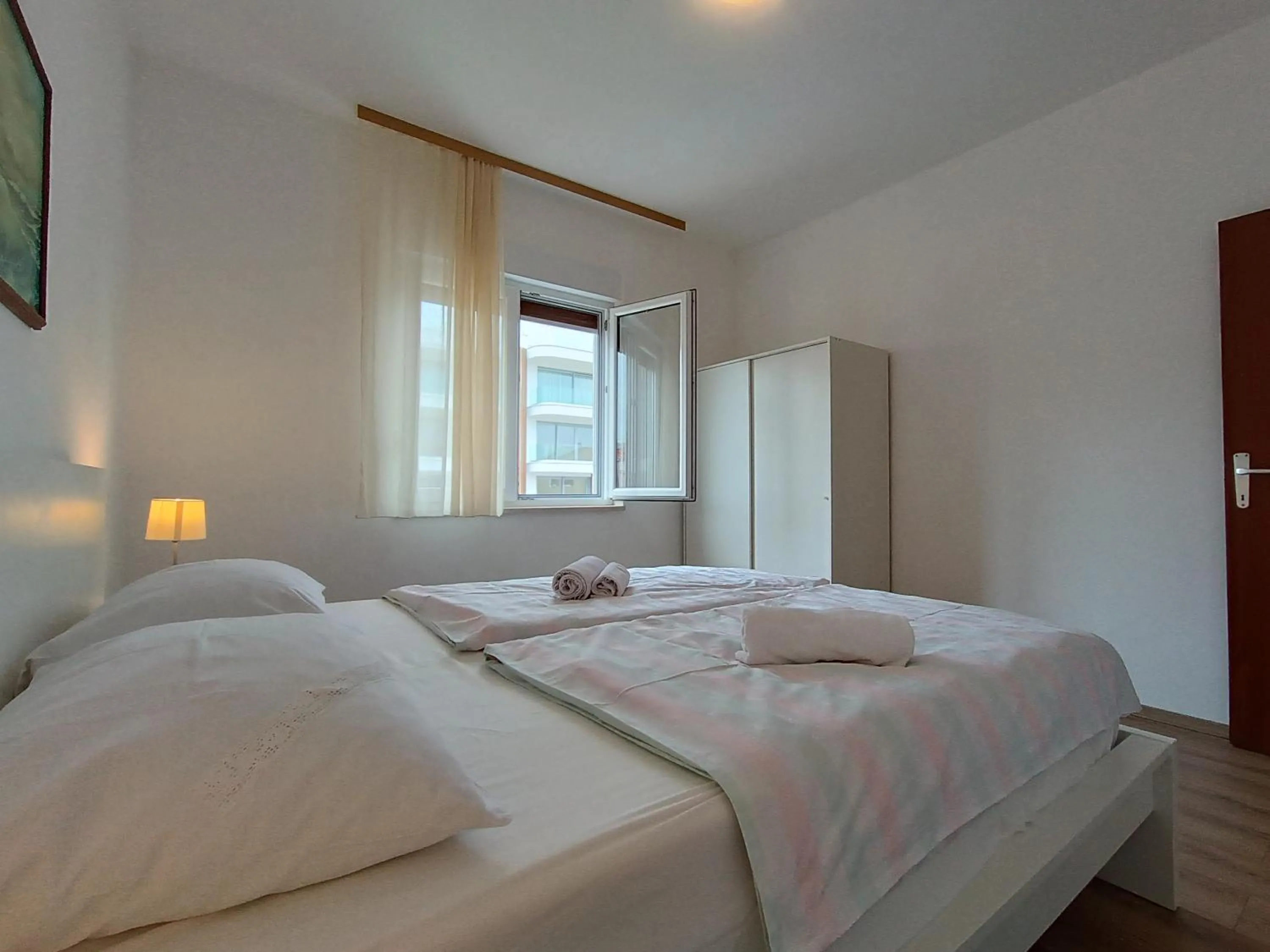 Bed in Apartments Mima