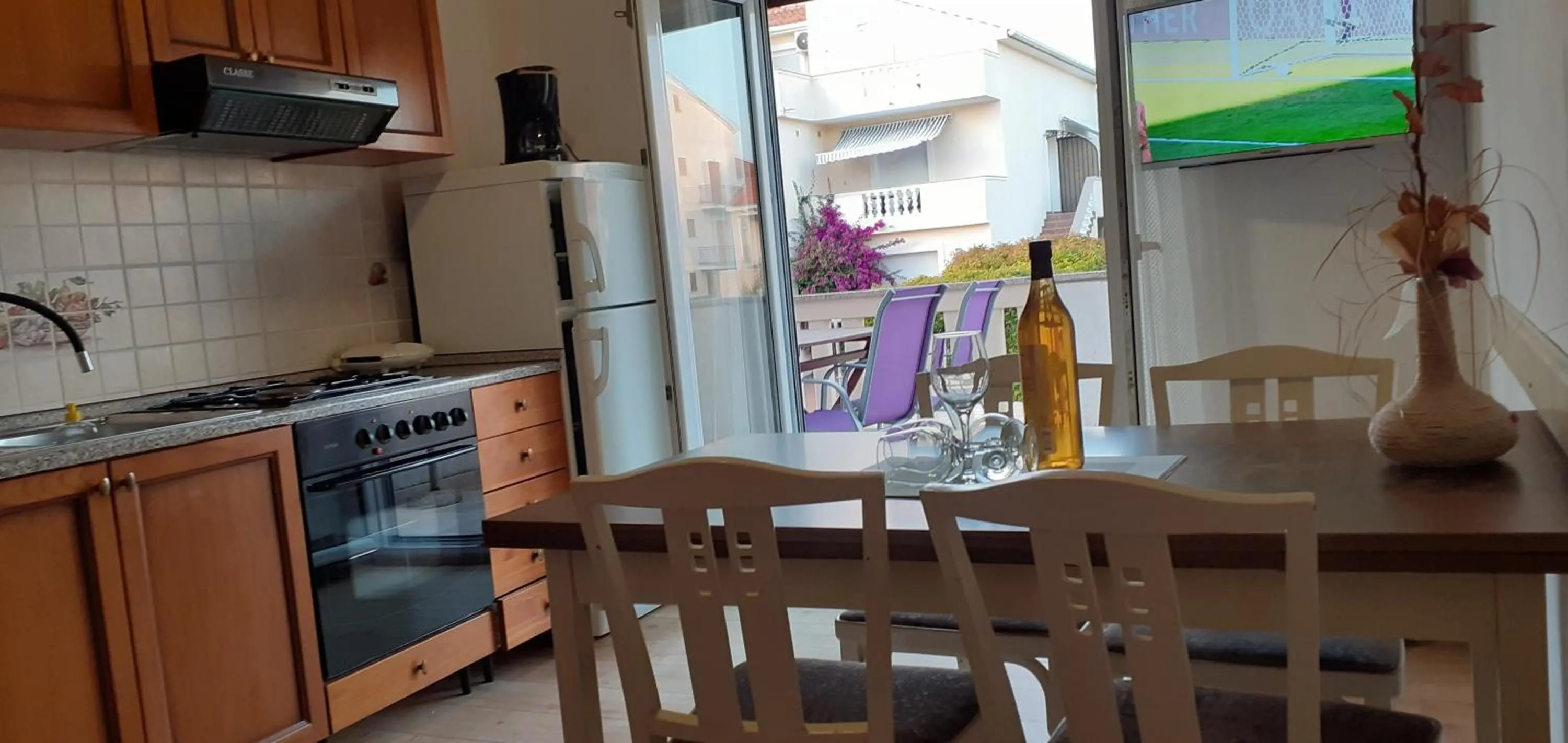 Kitchen or kitchenette in Apartments Mima