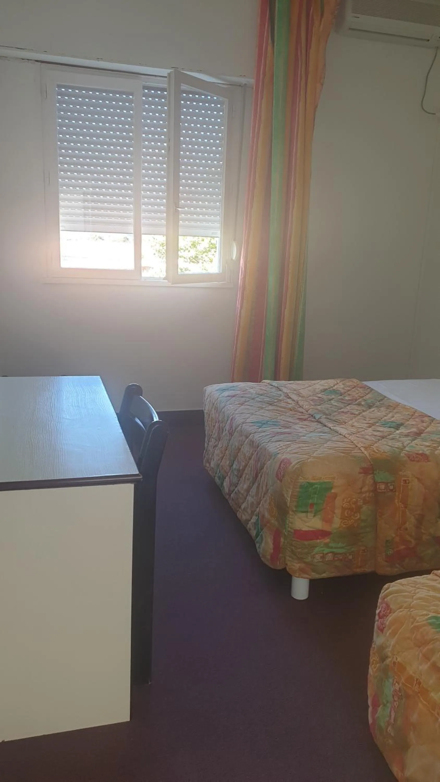 Bed in Hotel Madame Mere