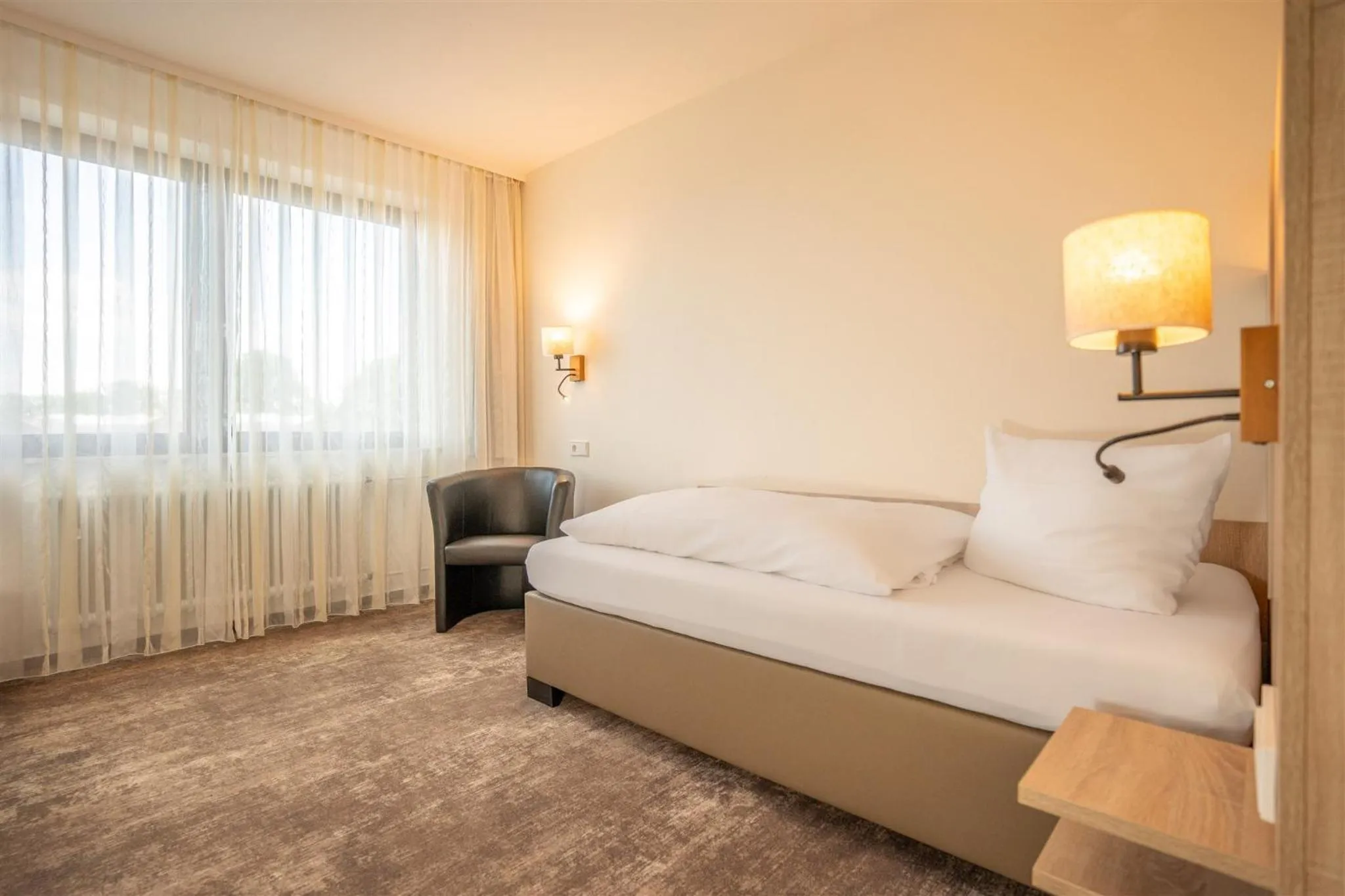 Photo of the whole room, Bed in Waldhotel Eisenberg