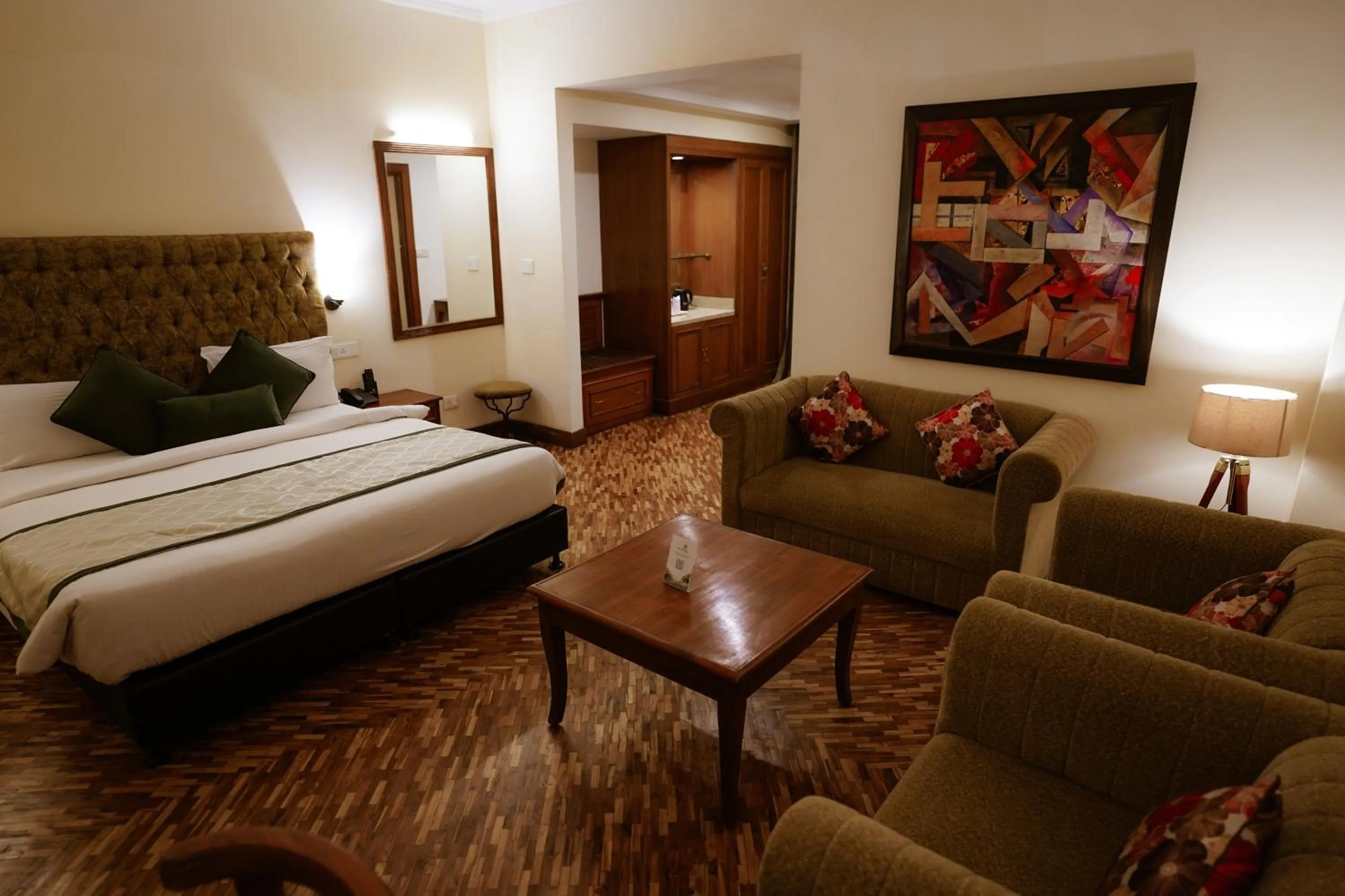 Seating area, Bed in Tulip Inn Green Castle Mall road