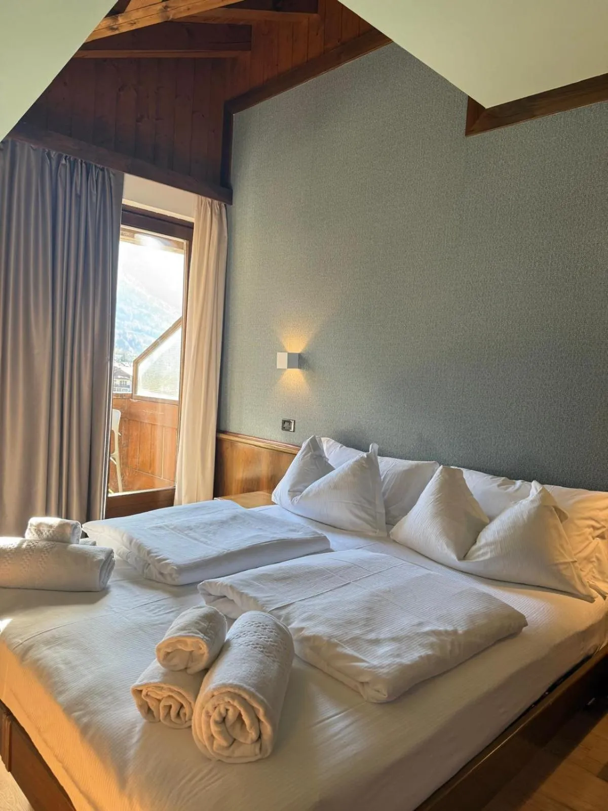 Bed in Aria Life Hotel Pinzolo