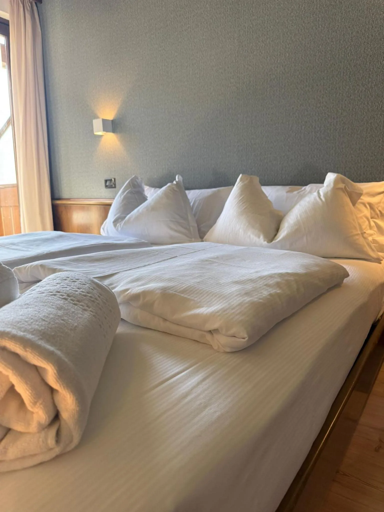 Bed in Aria Life Hotel Pinzolo