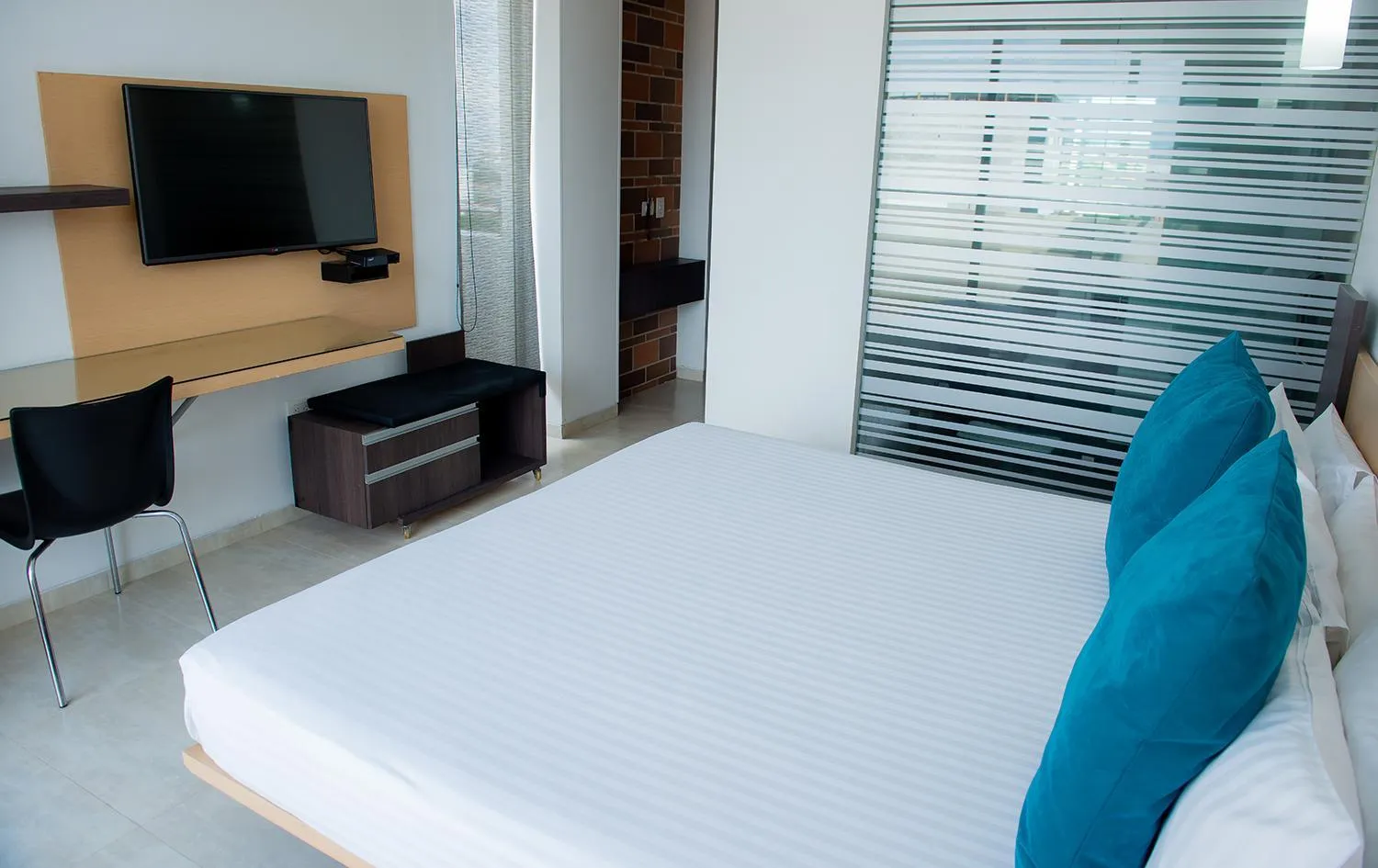 Communal lounge/ TV room, Bed in Hotel CasaBlanca Cucuta