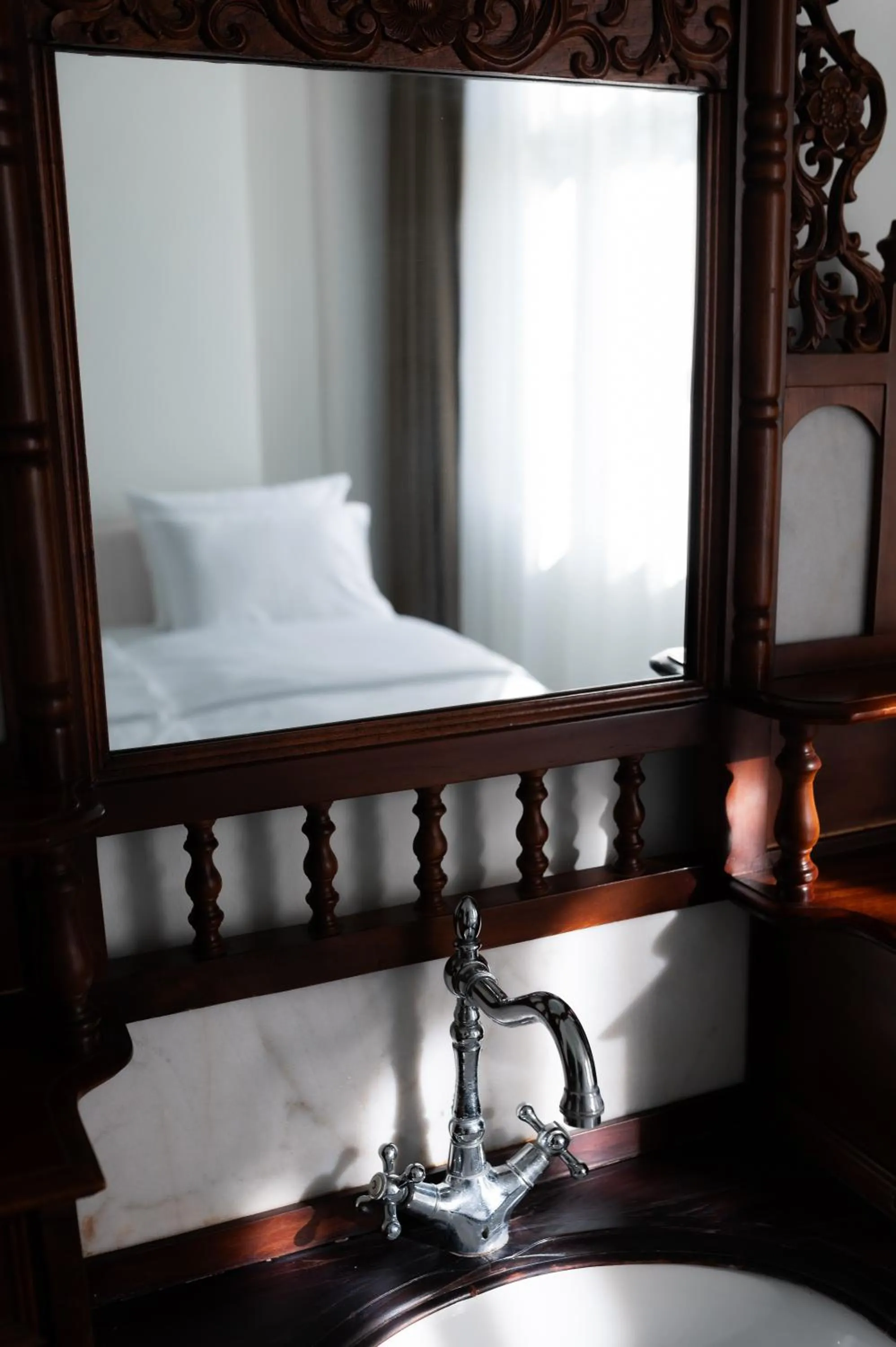 Bed in Garni Hotel Helvetia