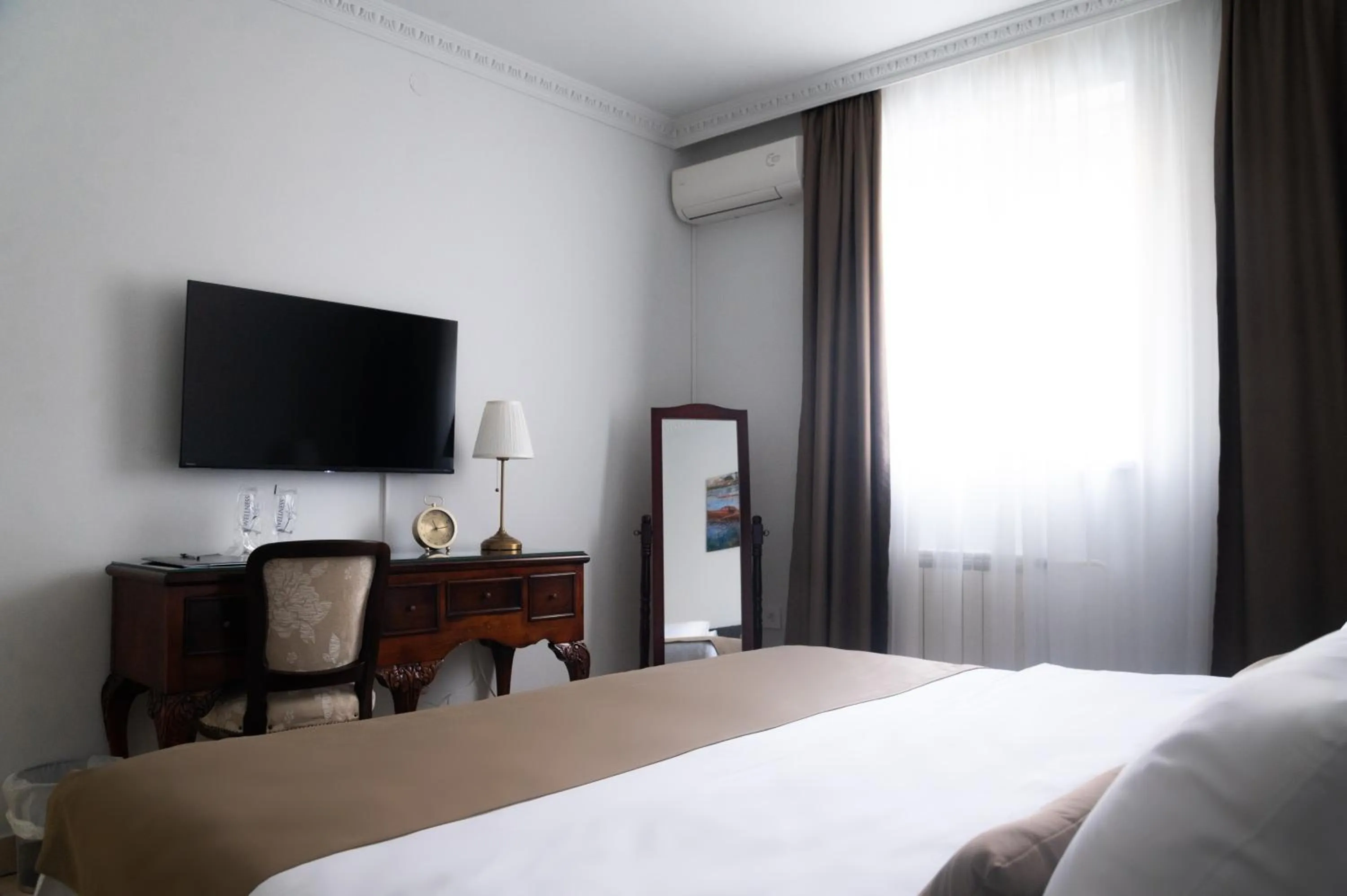 Bed in Garni Hotel Helvetia