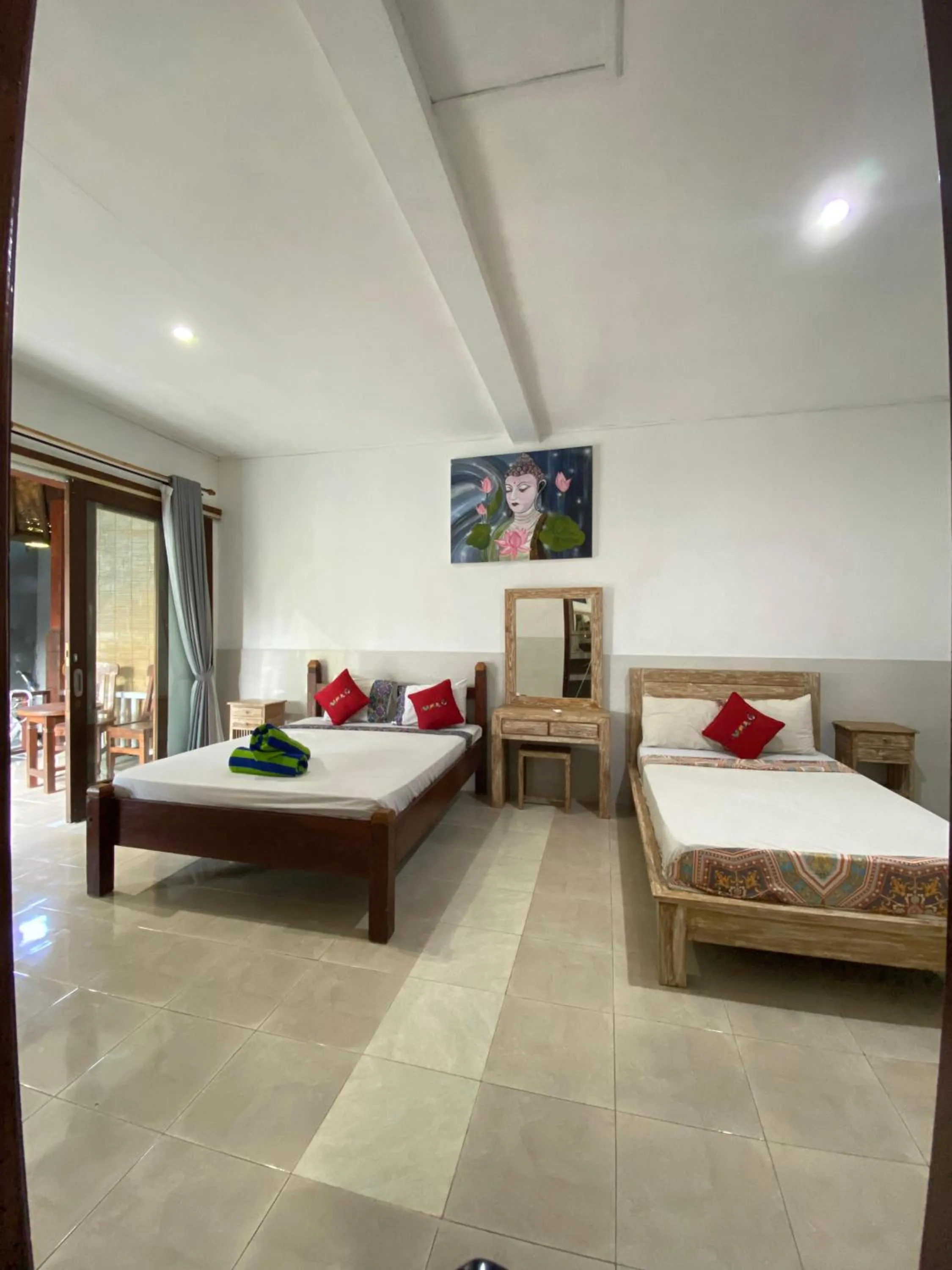 Bed in COCONUT BEACH BUNGALOWs & WARUNG 2