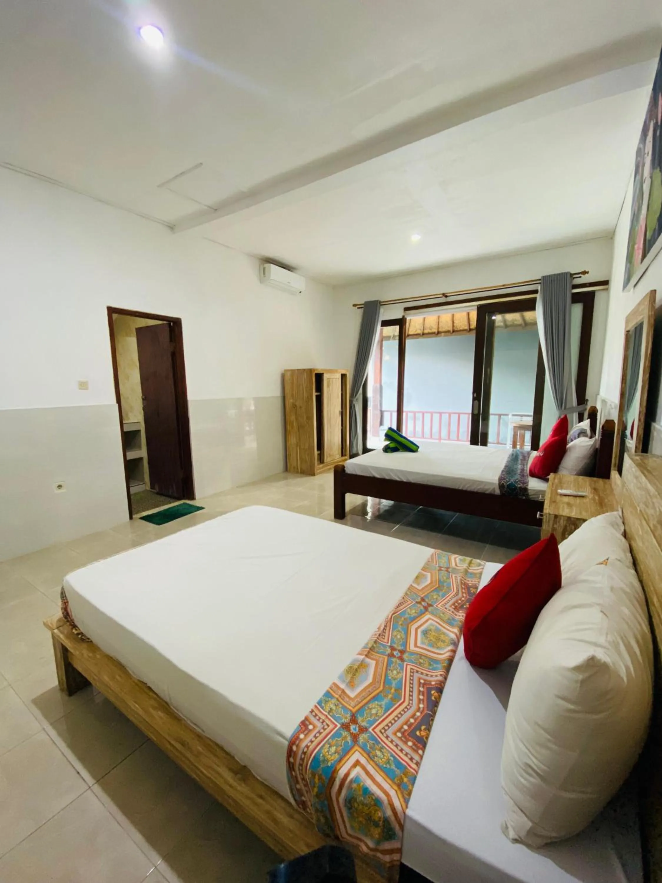 Bed in COCONUT BEACH BUNGALOWs & WARUNG 2