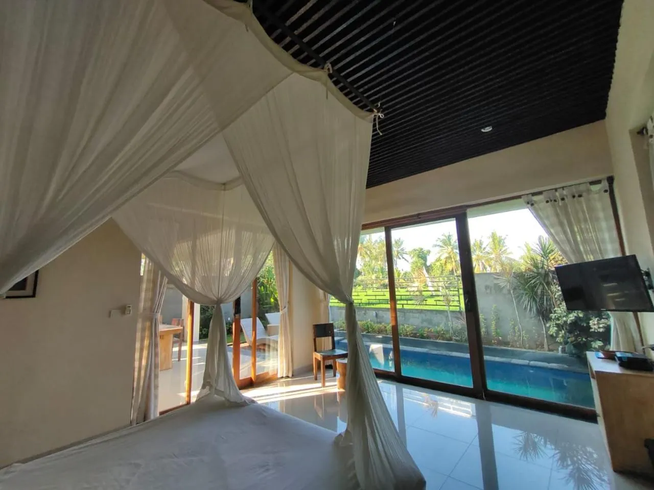 Bedroom in Asri Sari Ubud Villa & Resort