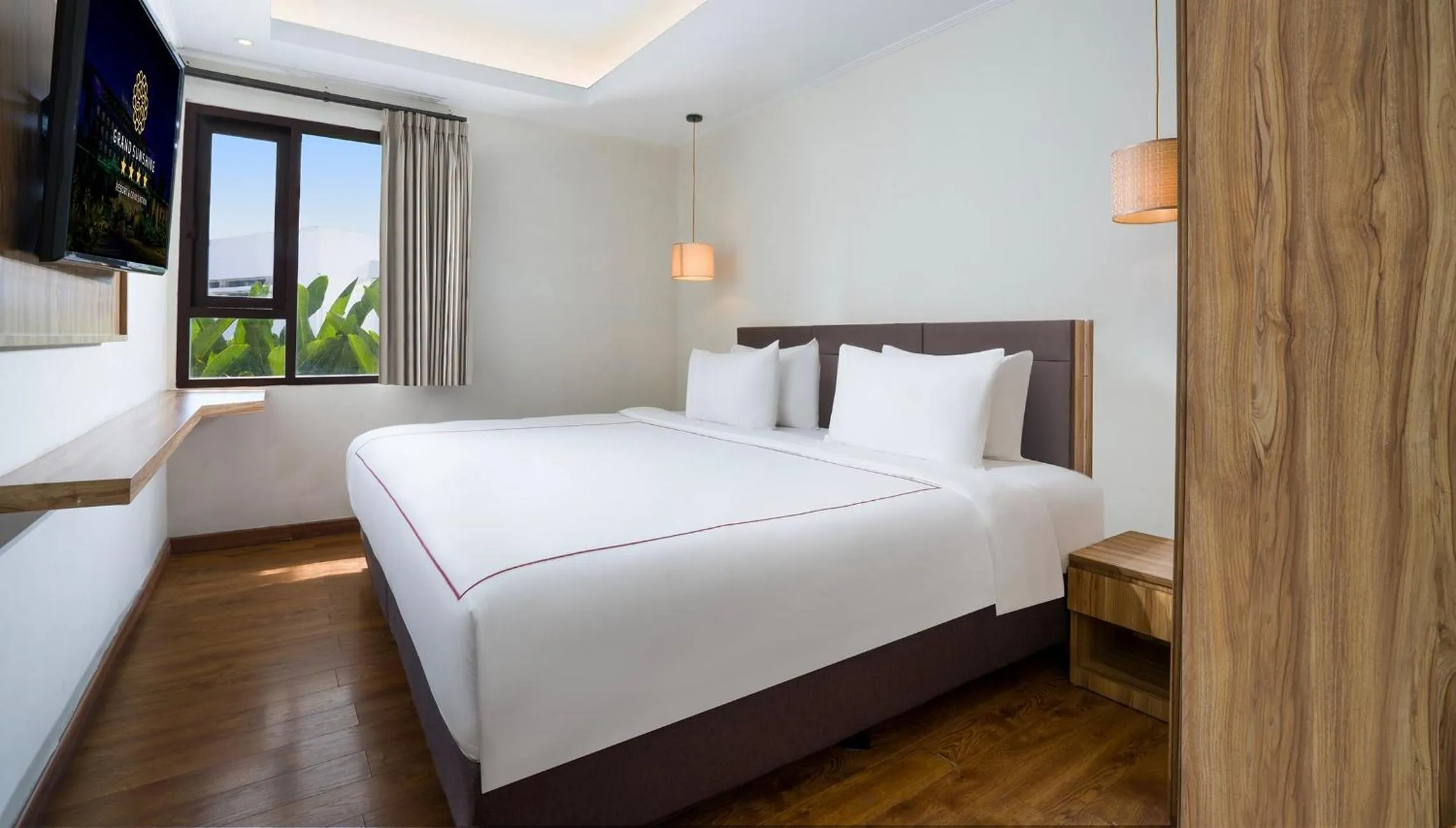 Bed in Grand Sunshine Resort & Convention