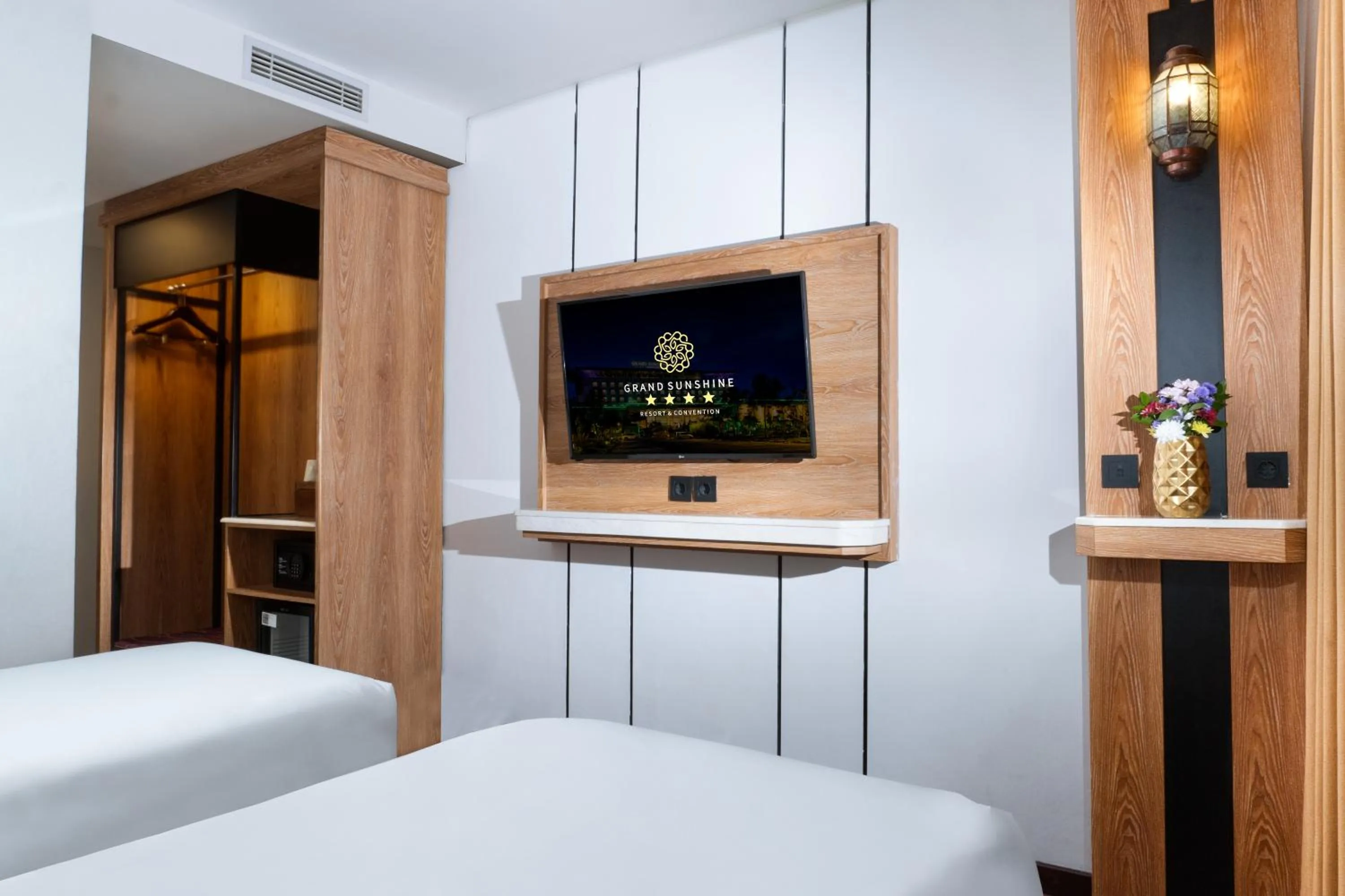 Bed in Grand Sunshine Resort & Convention