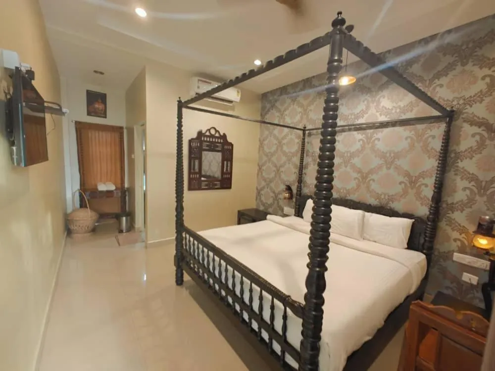Photo of the whole room, Bed in Chola Heritage Resort
