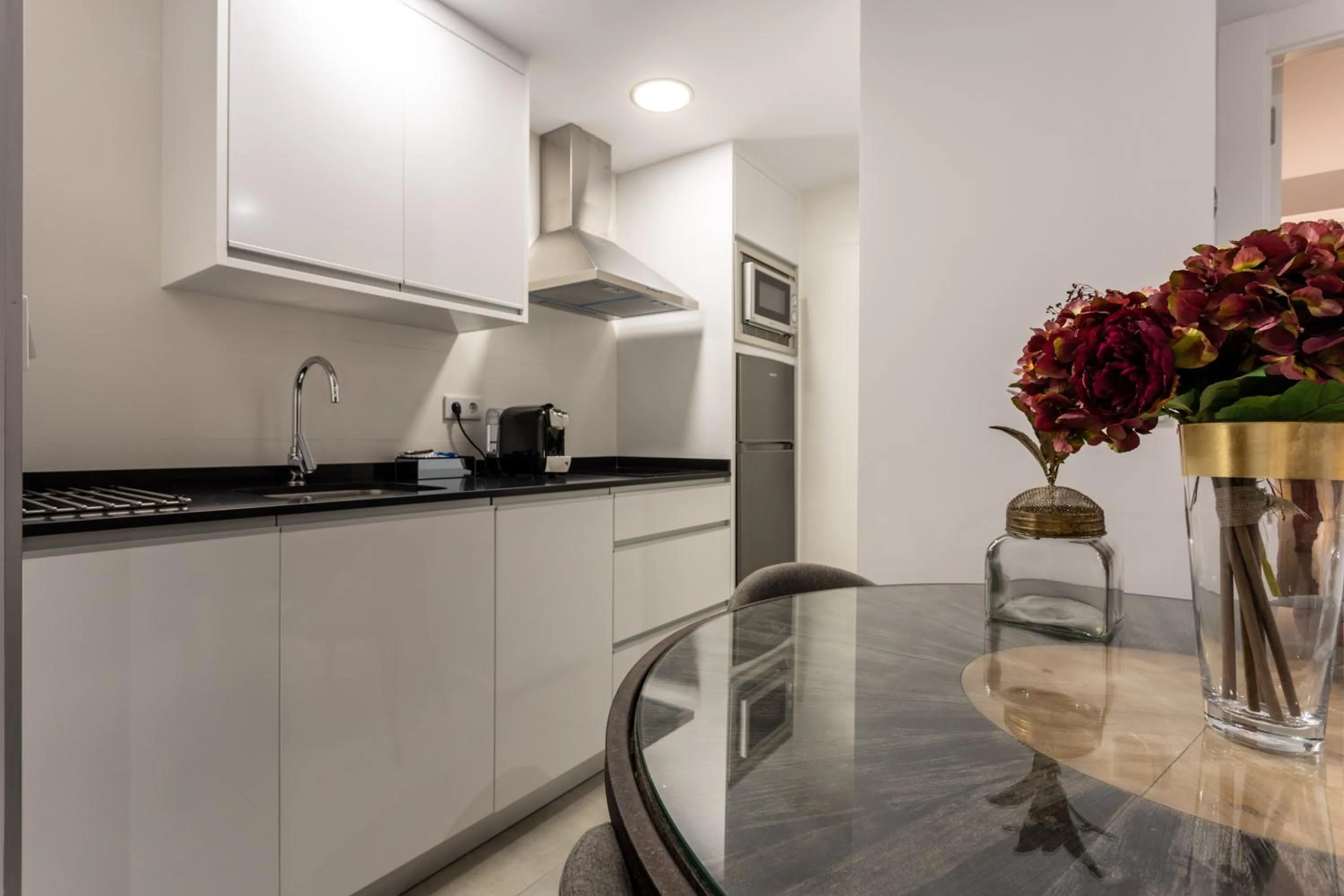 Kitchen or kitchenette in BiBo Suites Plaza Nueva