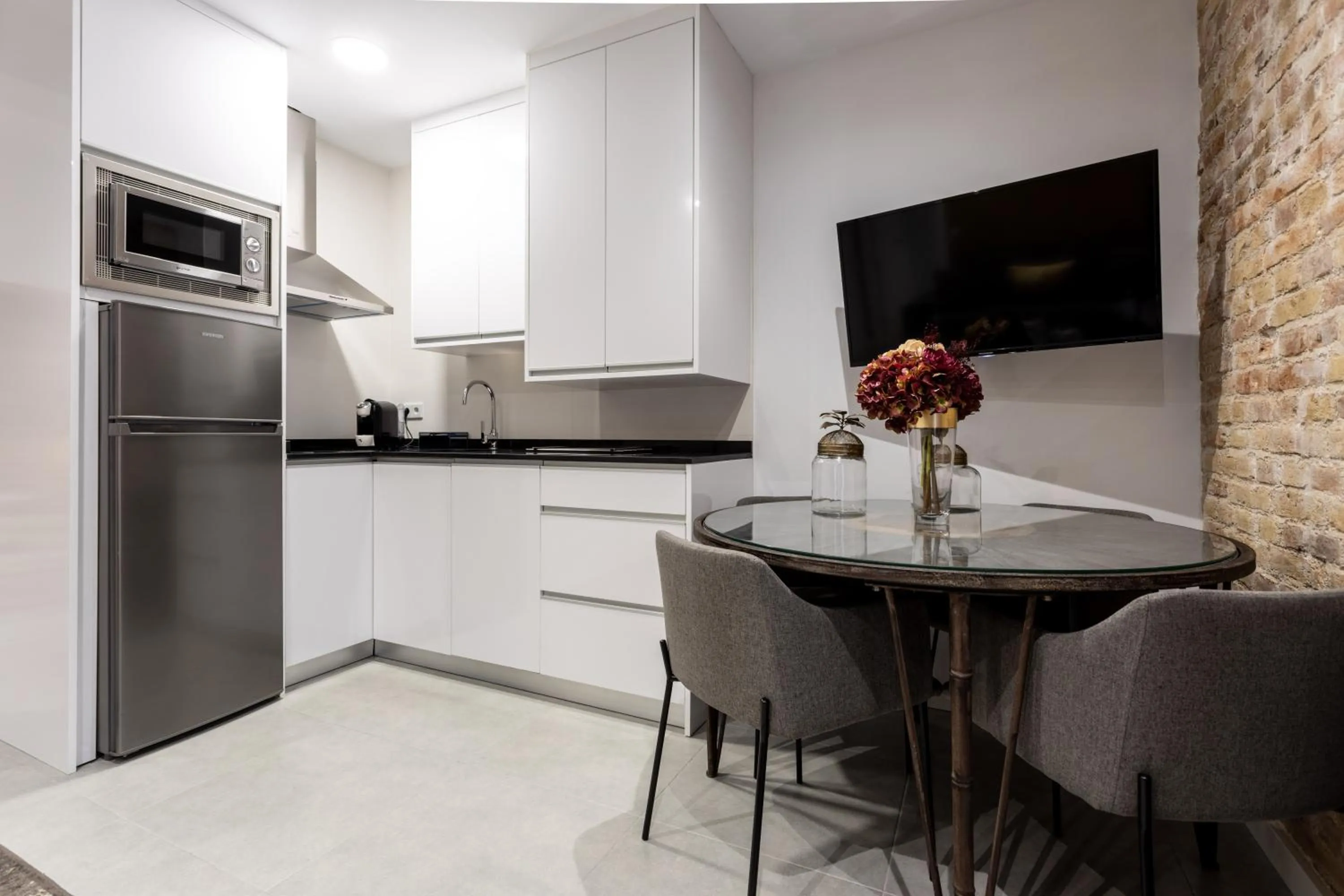 Kitchen or kitchenette in BiBo Suites Plaza Nueva