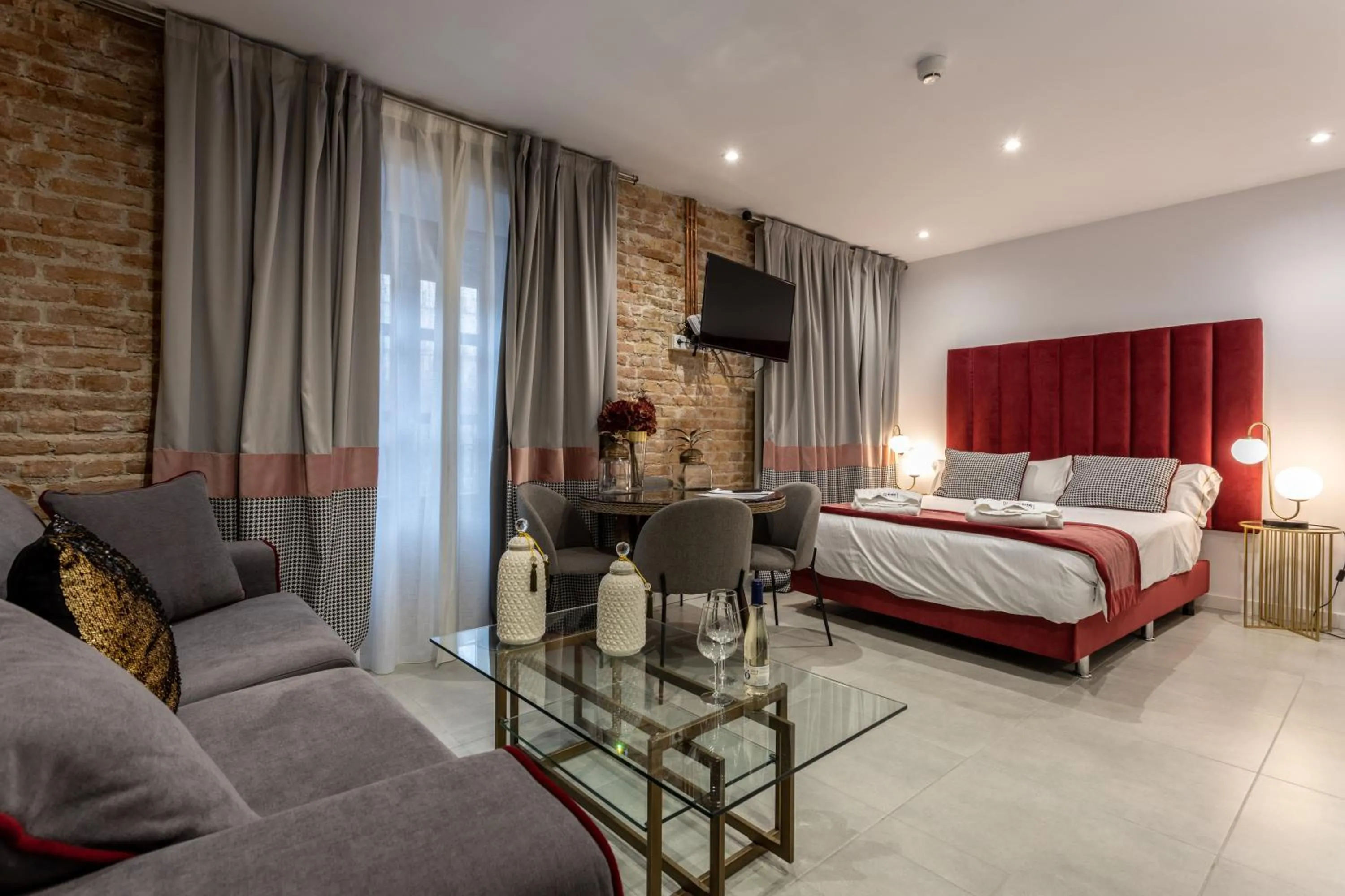 Photo of the whole room, Bed in BiBo Suites Plaza Nueva