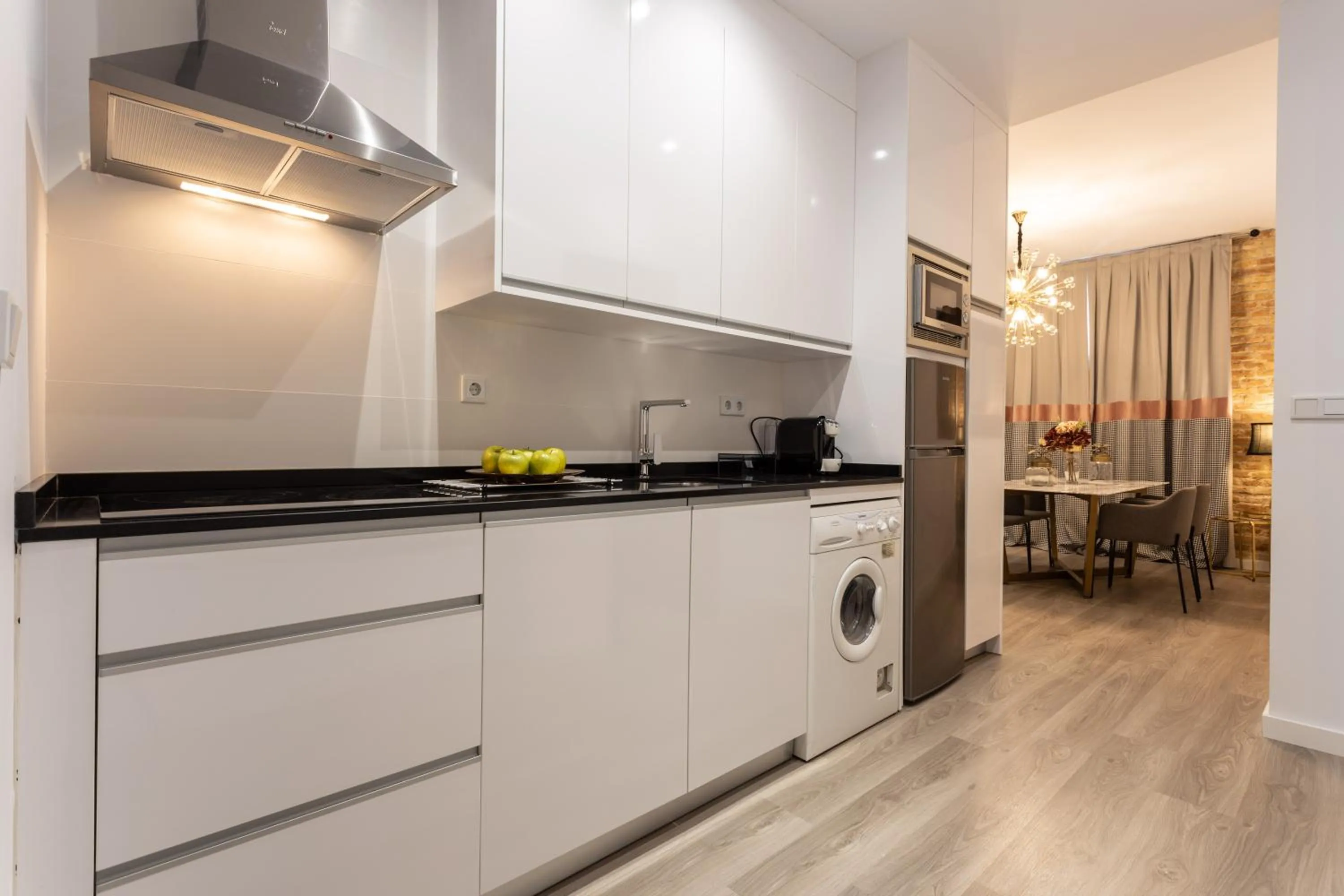 Kitchen or kitchenette in BiBo Suites Plaza Nueva