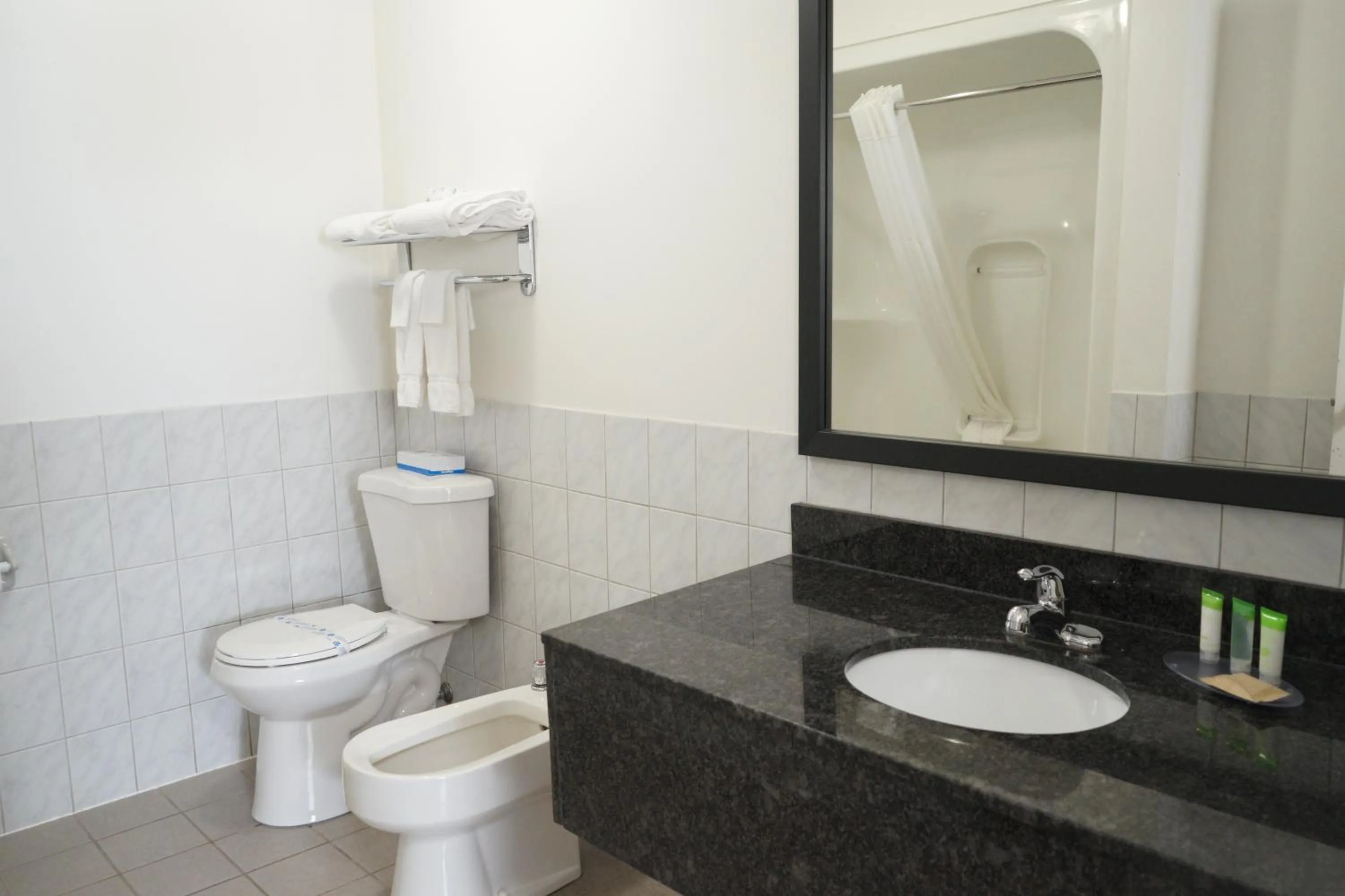 Toilet in Jolly Roger Inn & Resort