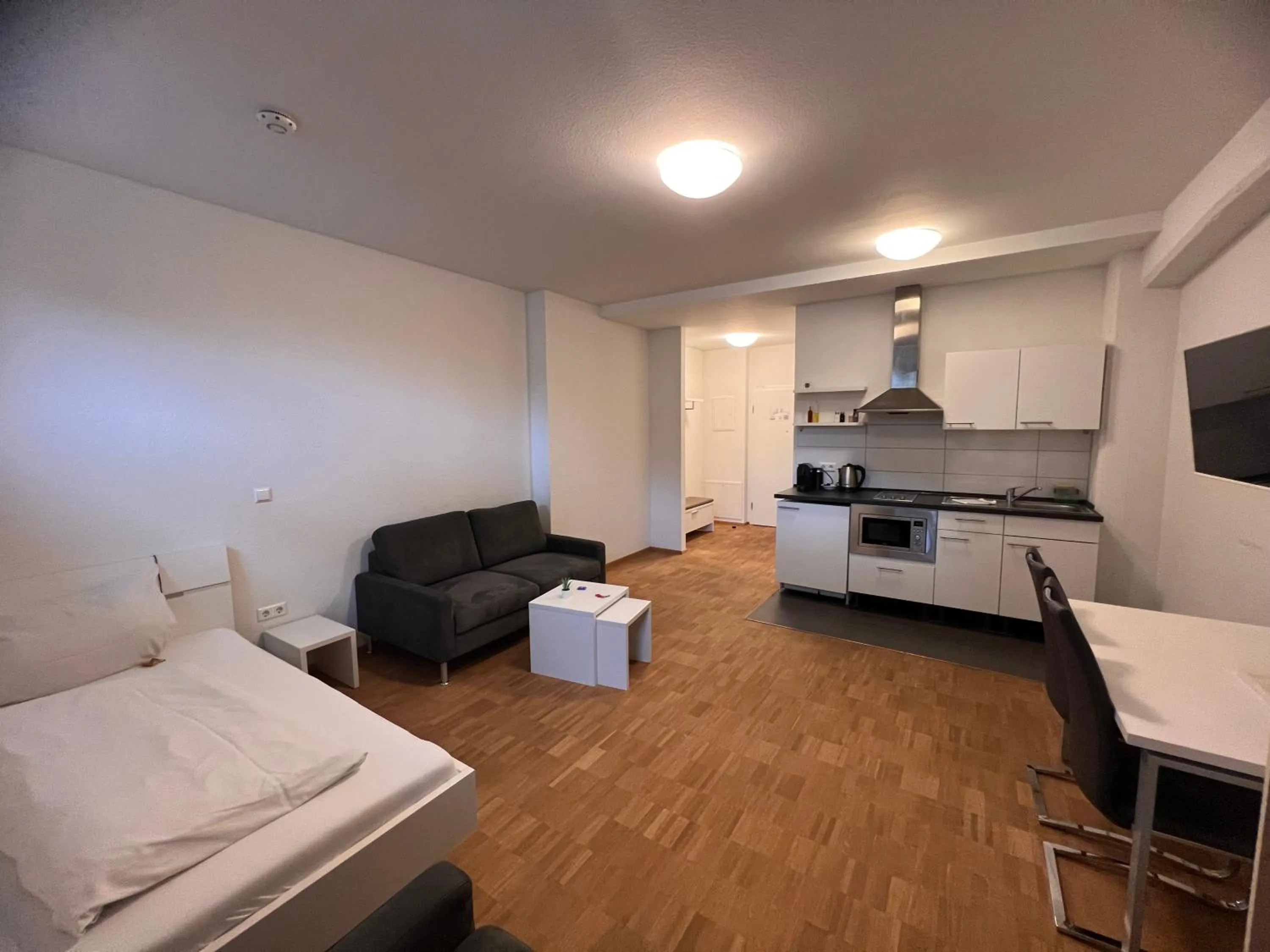 Seating area, Bed in New Age Boardinghaus