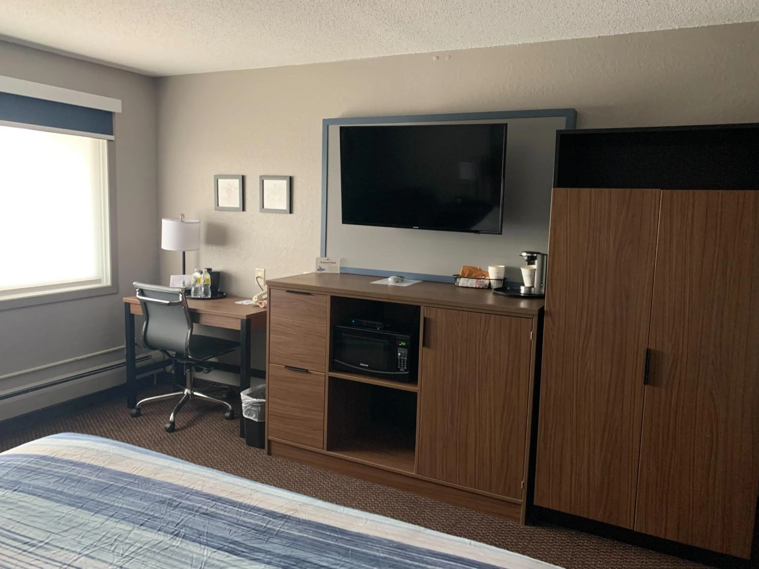 Photo of the whole room, Bed in AmericInn by Wyndham New Richmond
