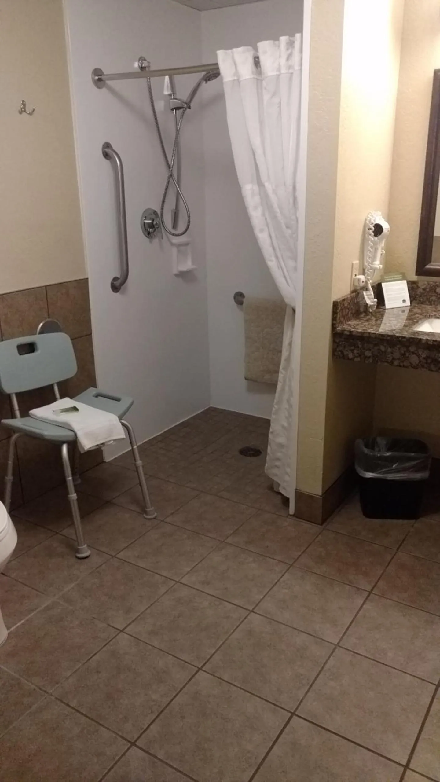 Shower in AmericInn by Wyndham New Richmond