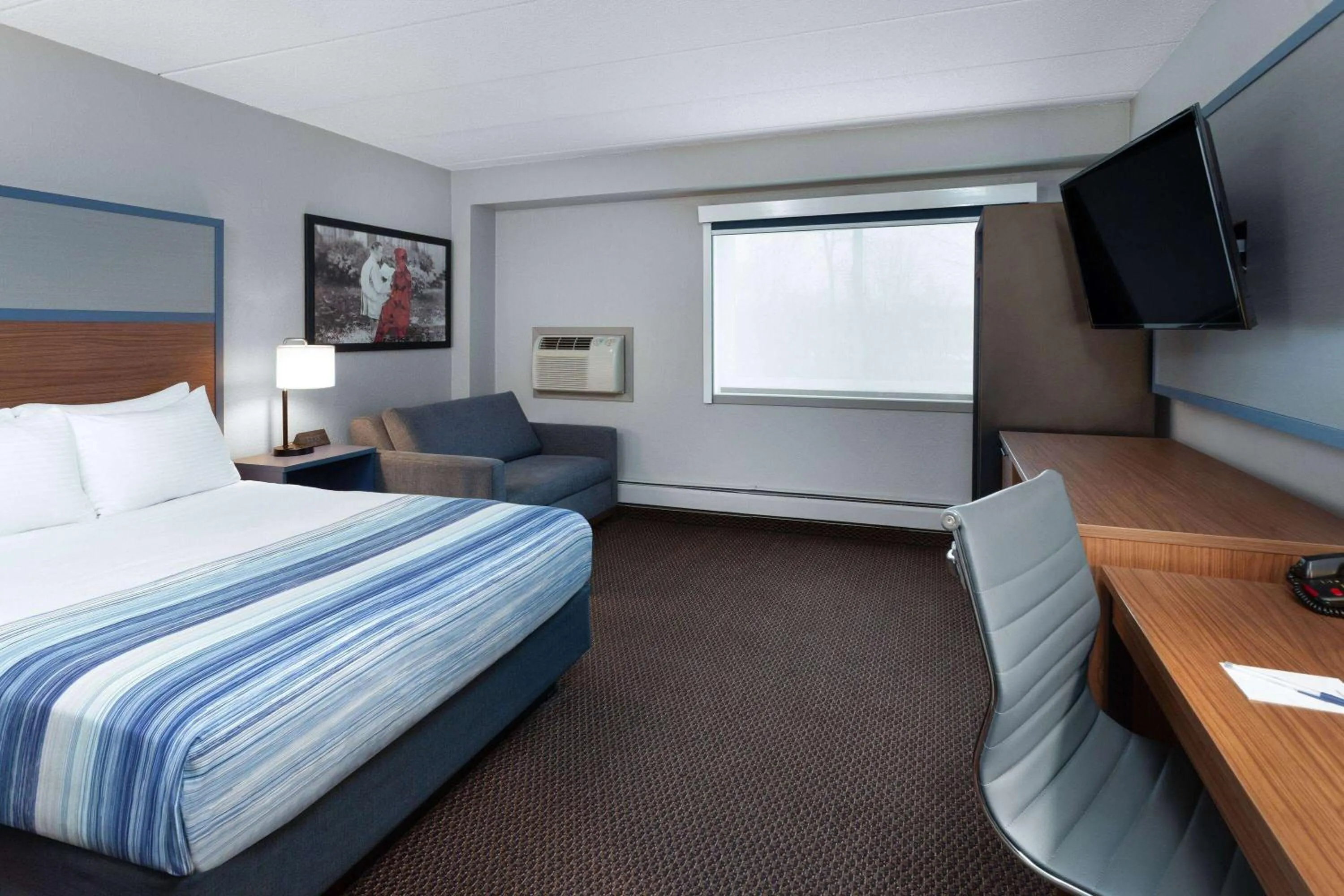 Photo of the whole room, Bed in AmericInn by Wyndham New Richmond