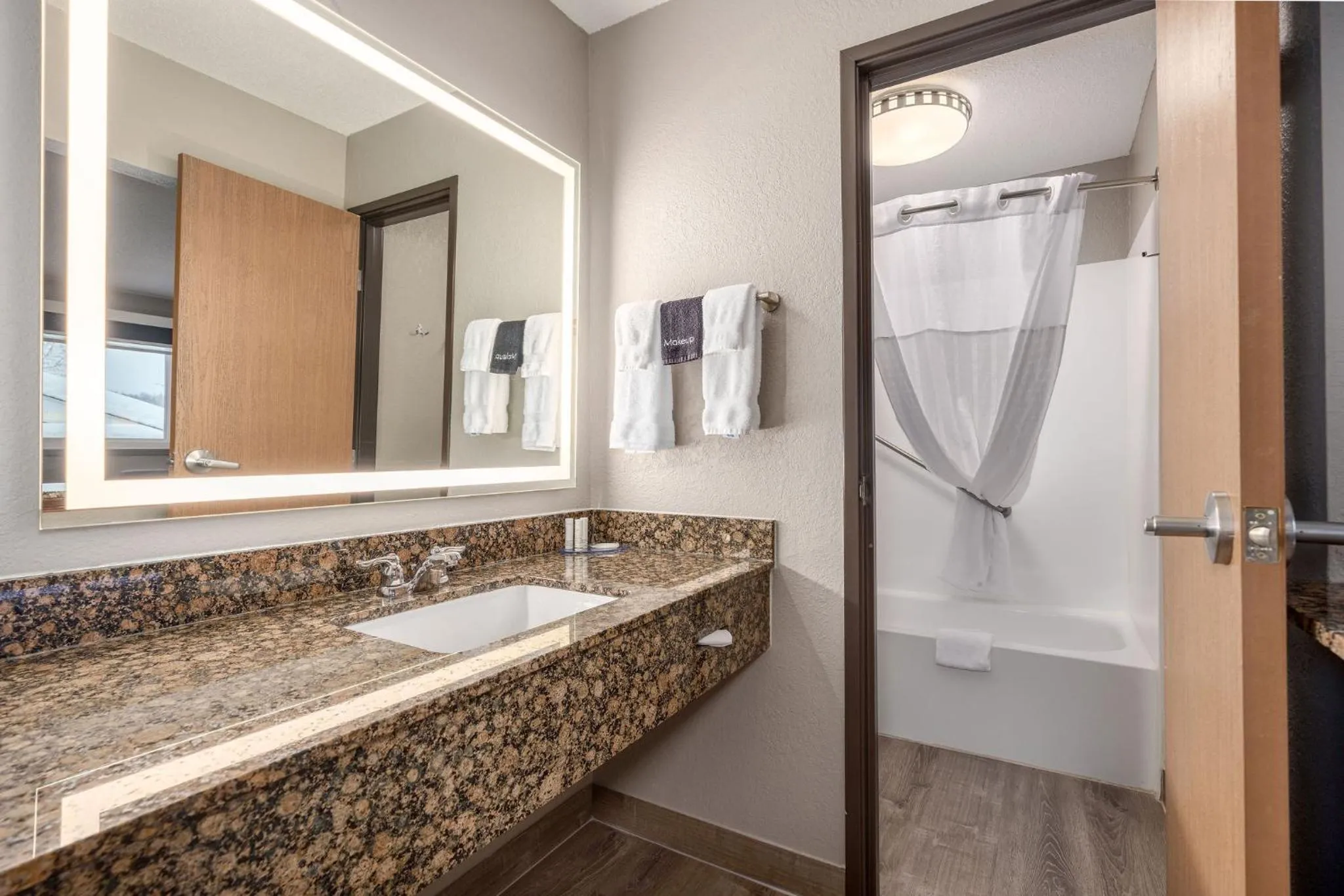 Bathroom in AmericInn by Wyndham New Richmond