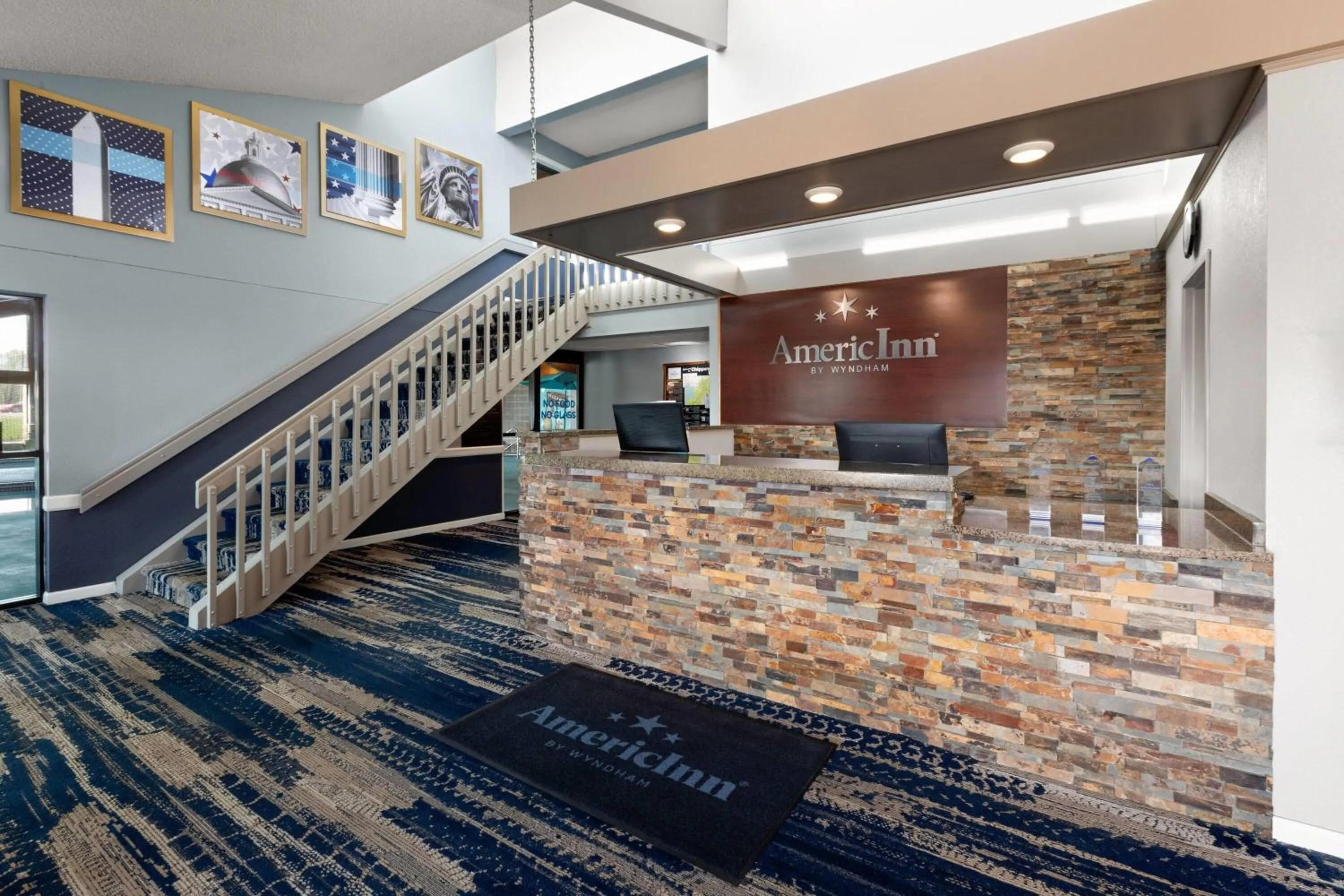 Lobby or reception in AmericInn by Wyndham Chippewa Falls