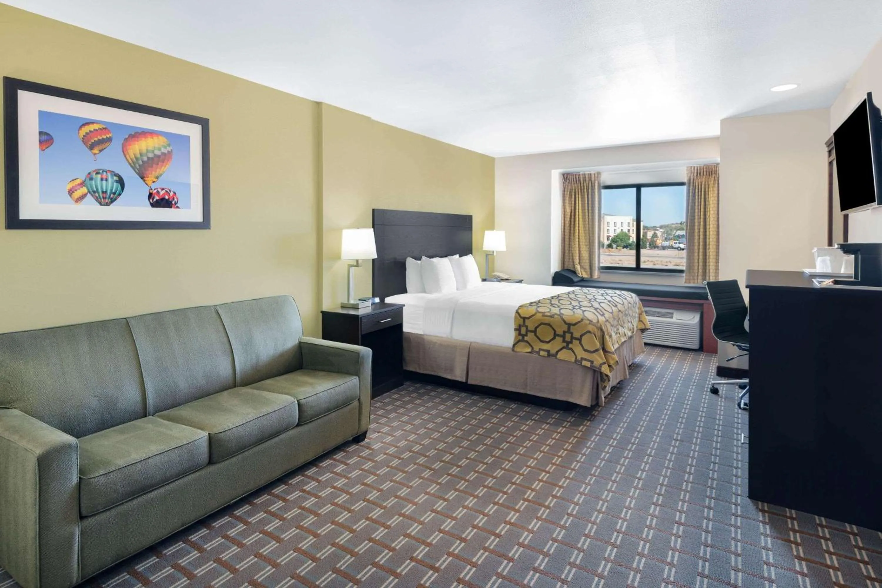 Photo of the whole room, Bed in Baymont by Wyndham Farmington