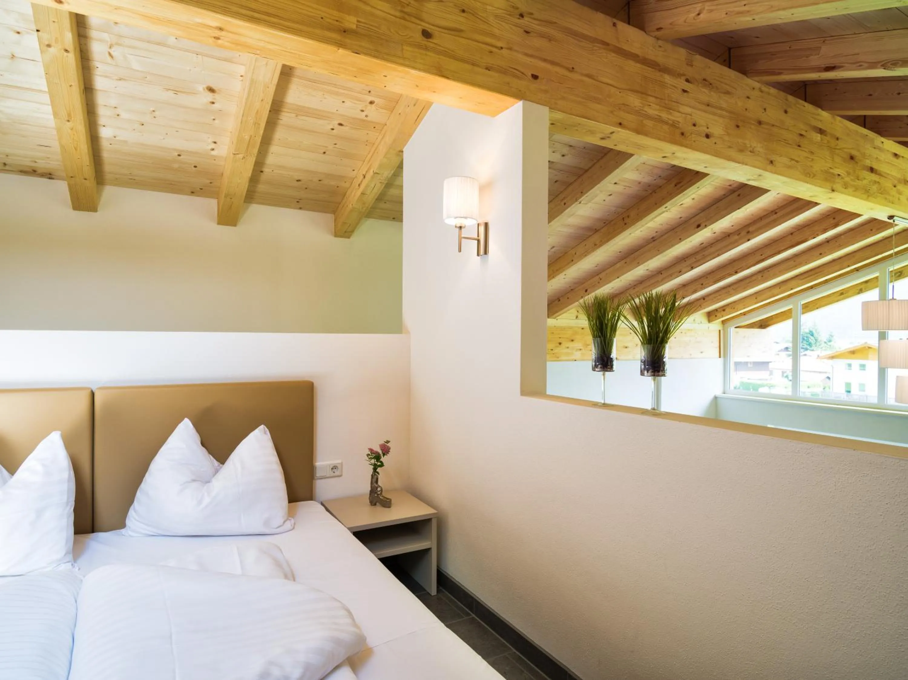 Bedroom, Bed in AlpenParks Chalet & Apartment AreitXpress