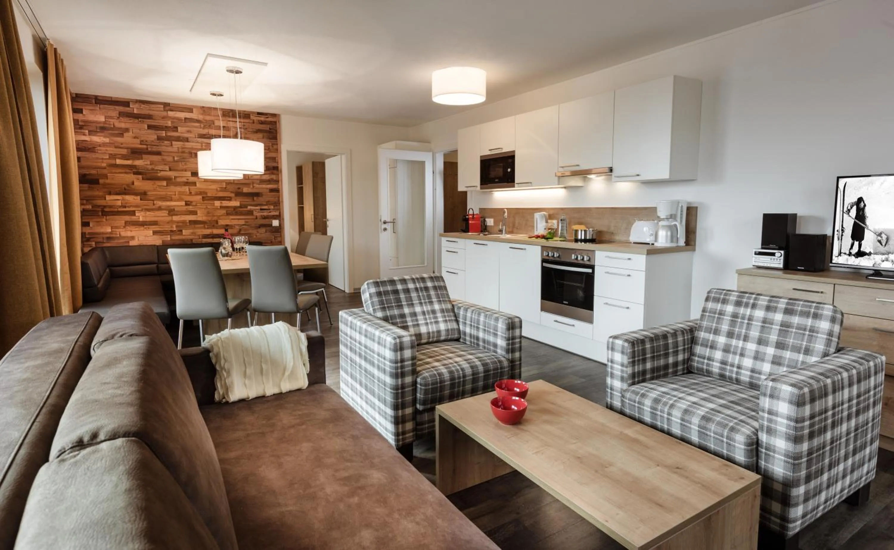 Kitchen or kitchenette in AlpenParks Chalet & Apartment AreitXpress