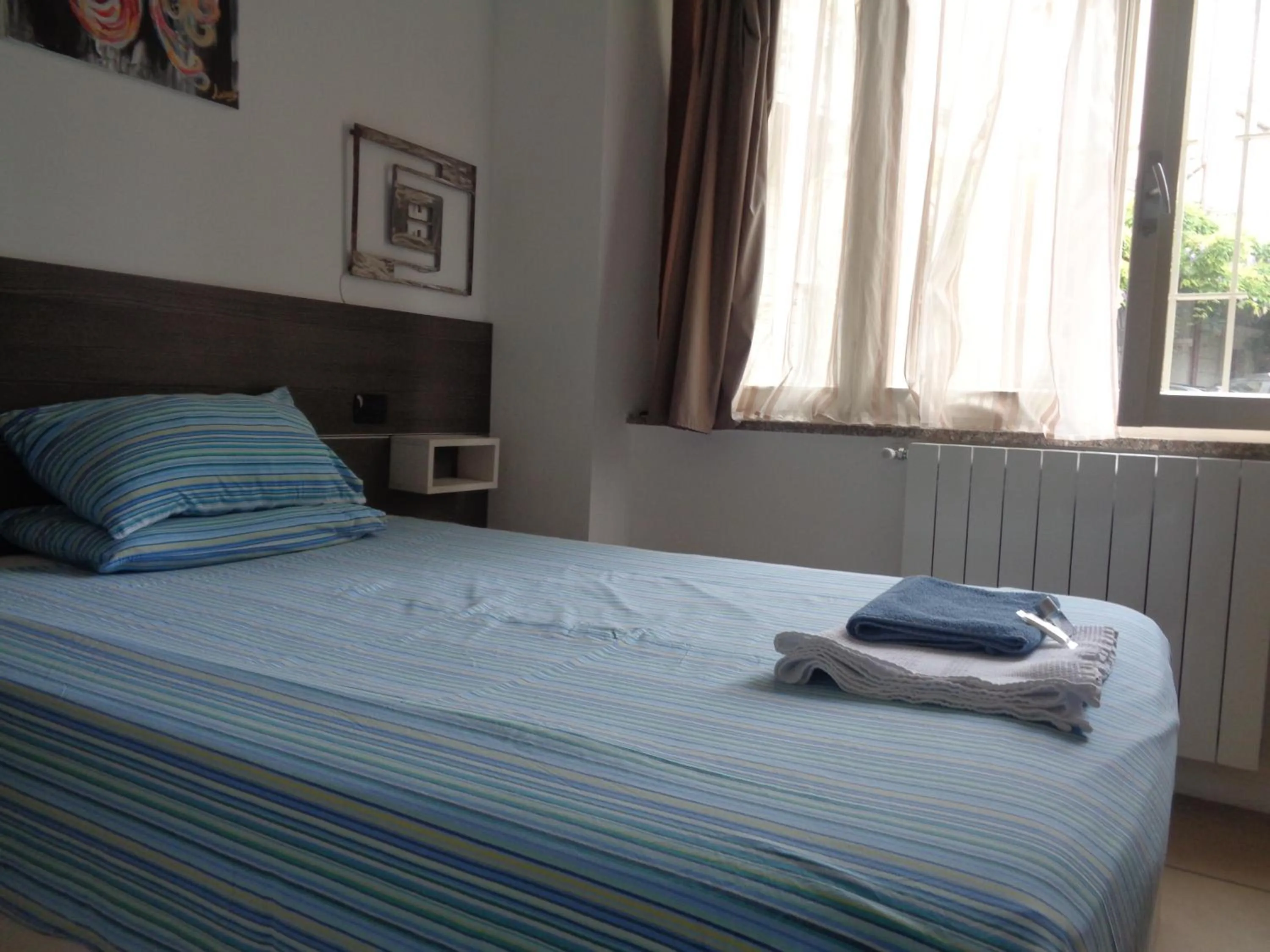 Photo of the whole room, Bed in Prenditempo