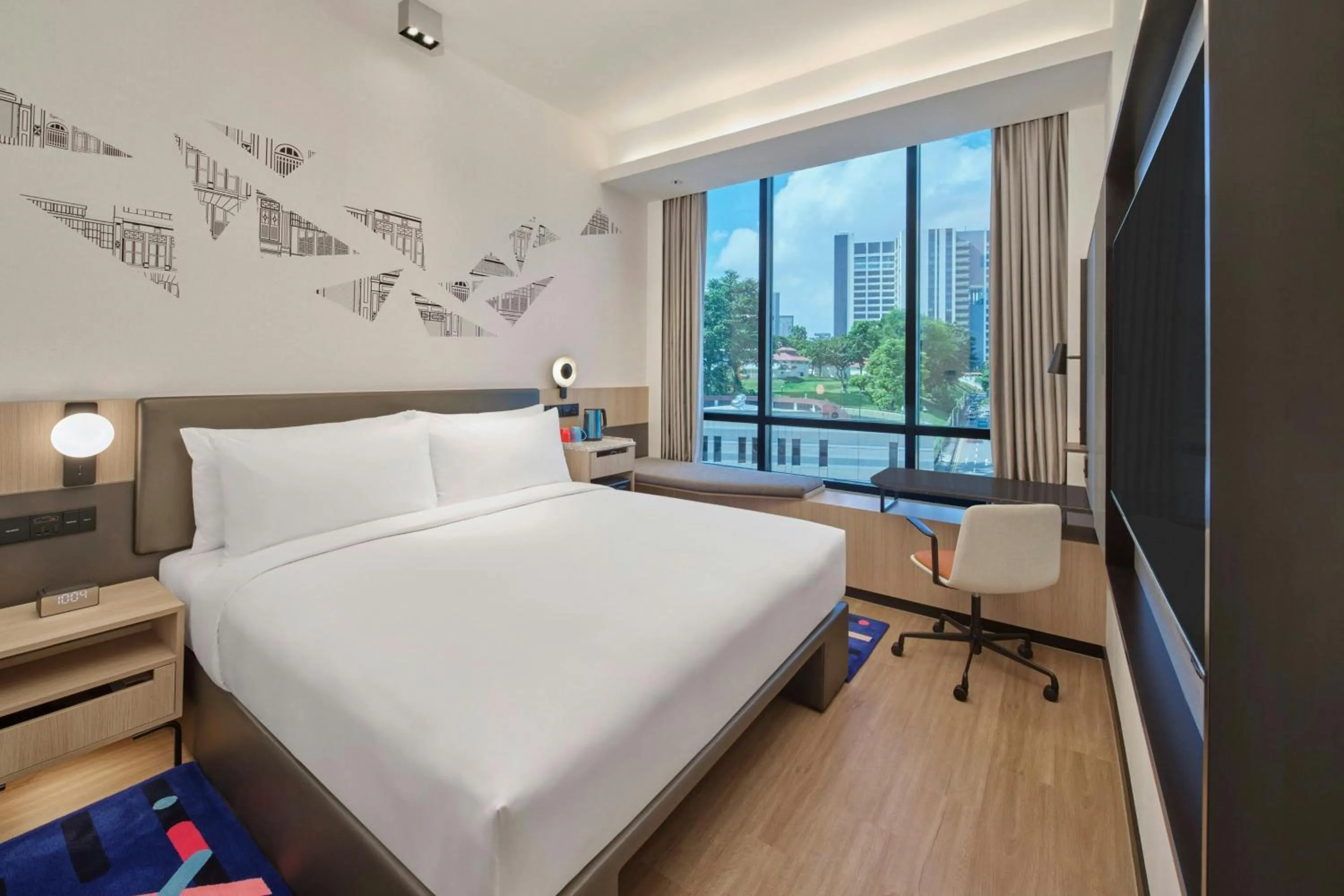 Photo of the whole room, Bed in Aloft Singapore Novena