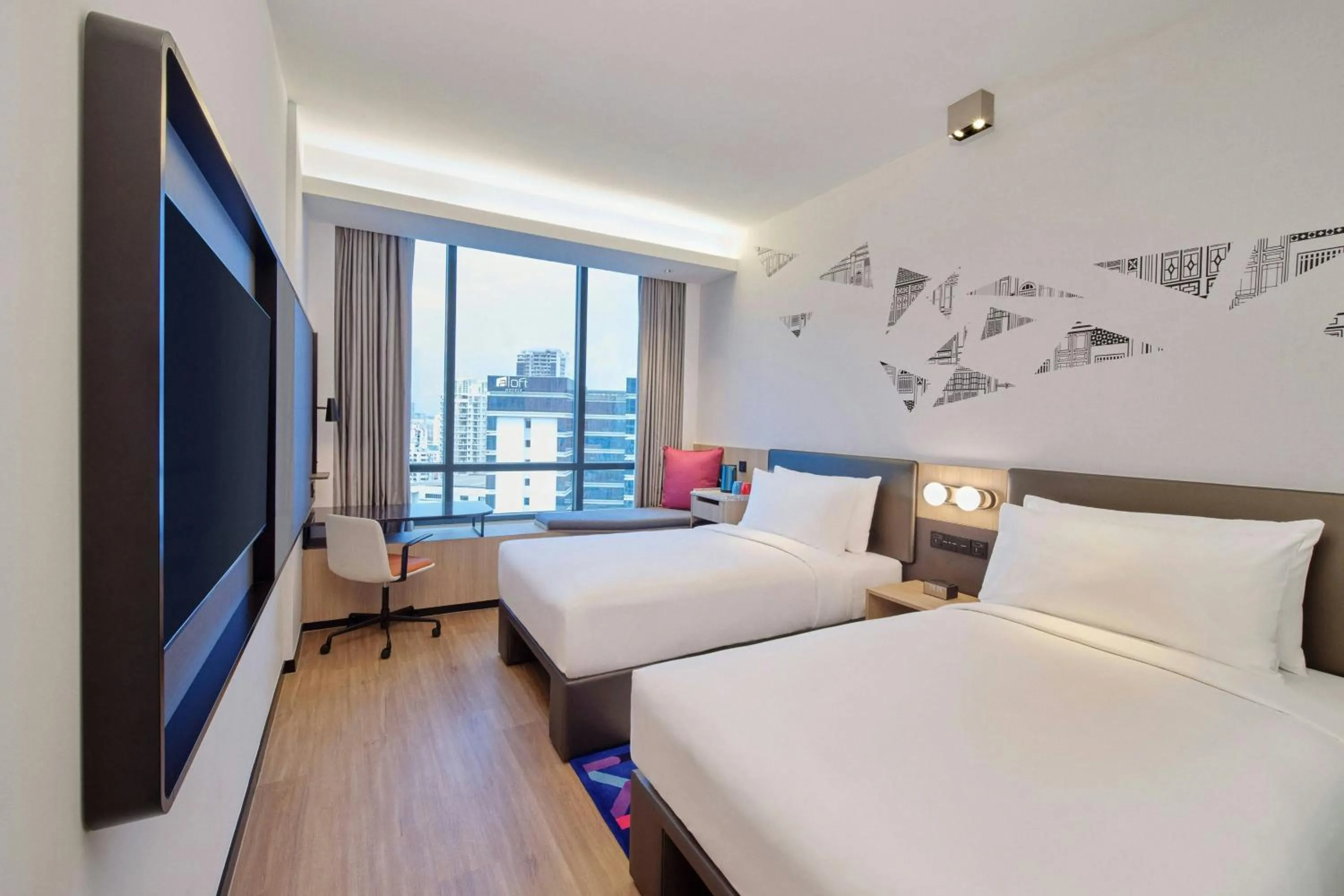 Photo of the whole room, Bed in Aloft Singapore Novena