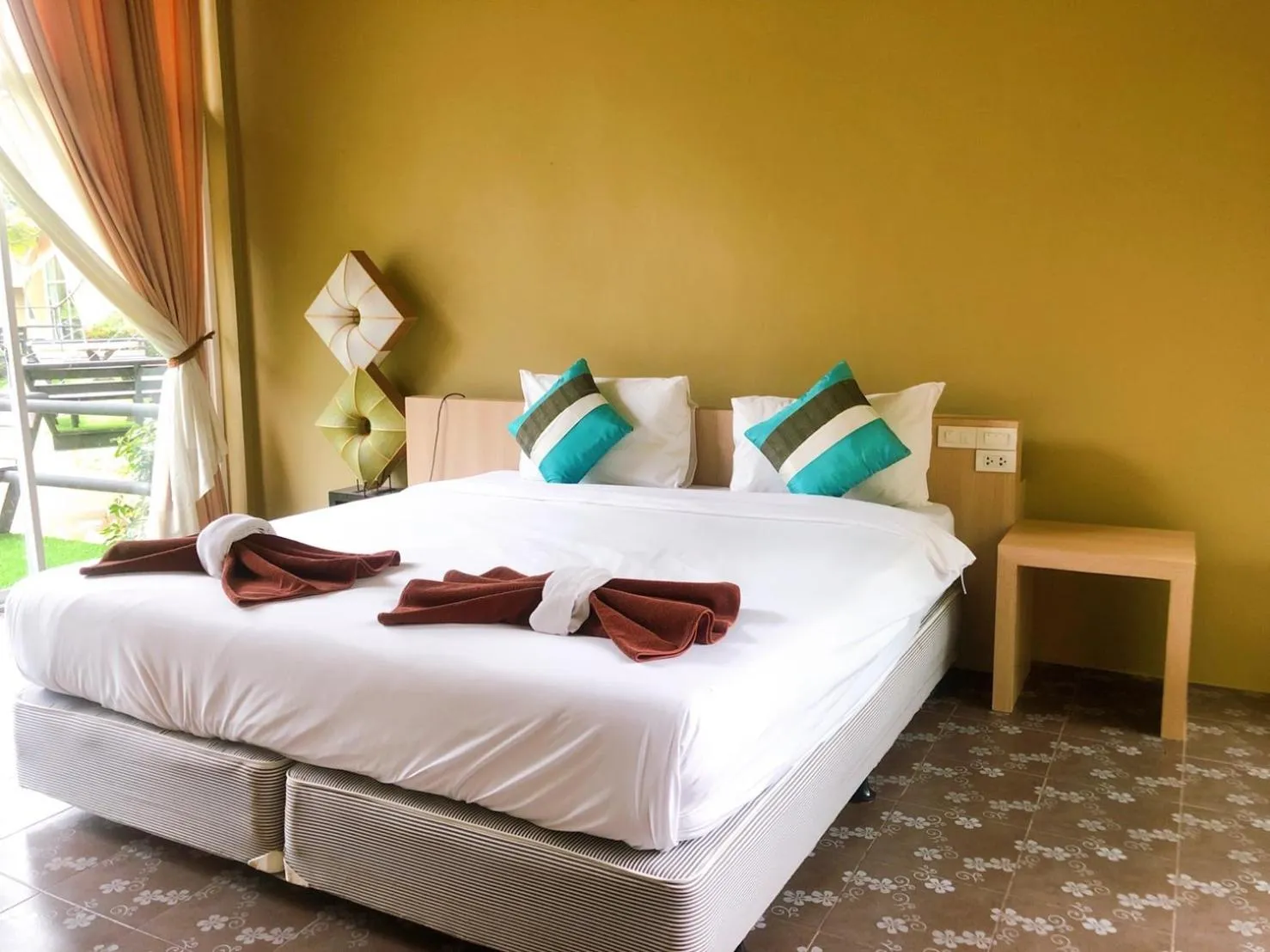 Bed in Aurora Resort Khao Yai