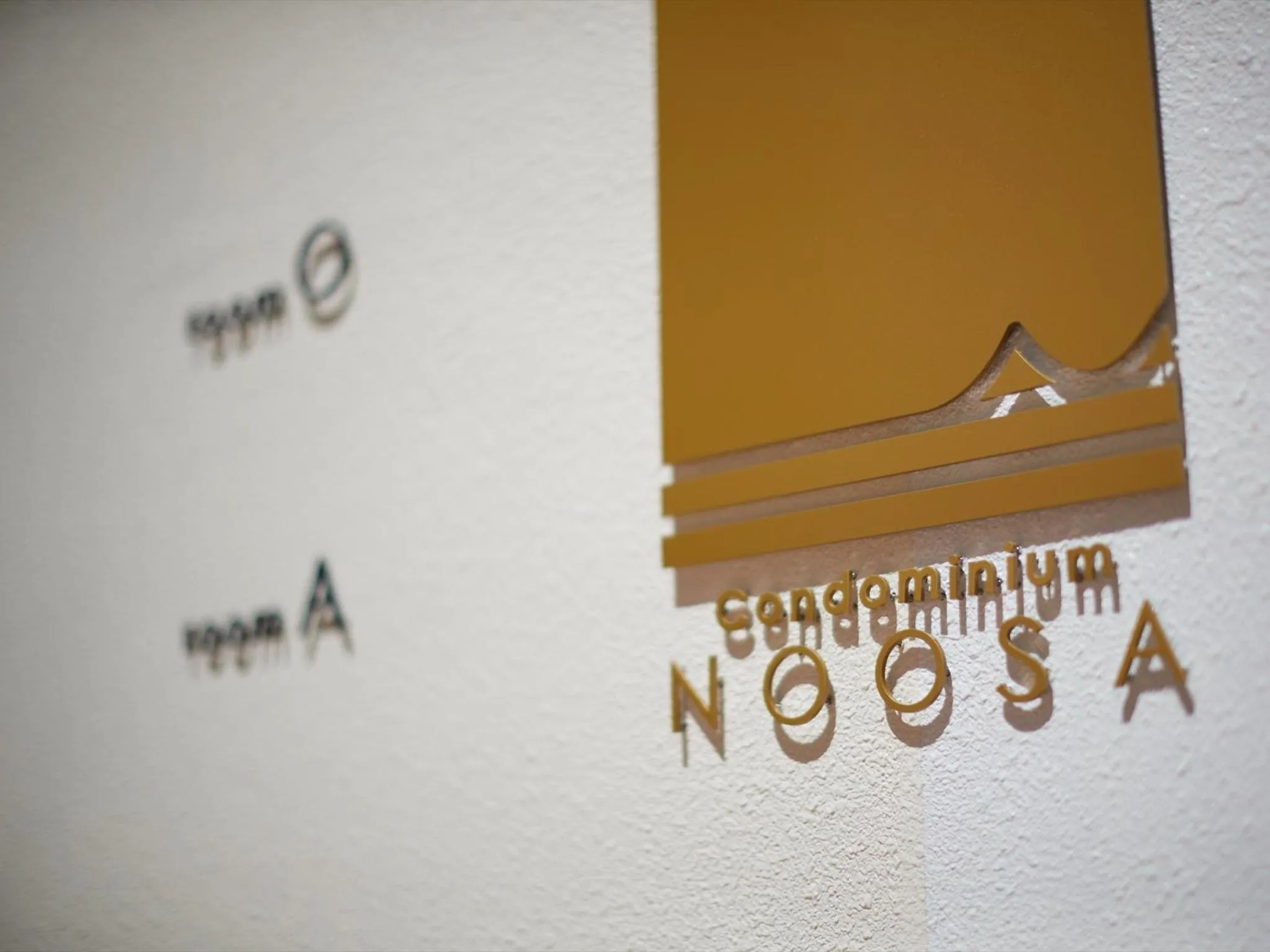 Logo/Certificate/Sign in Condominium NOOSA