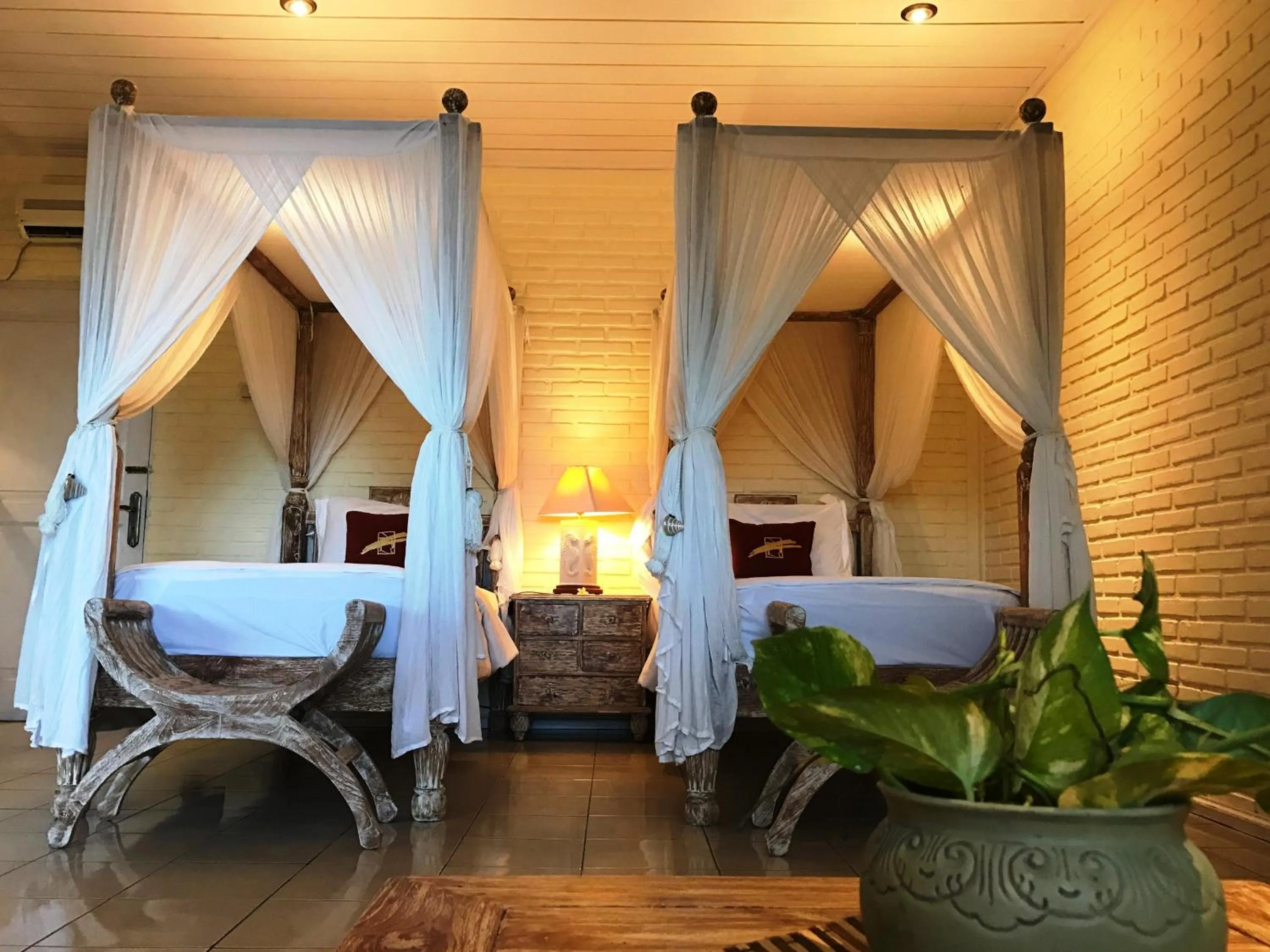 Bed in Tauch Terminal Resort Tulamben & Spa