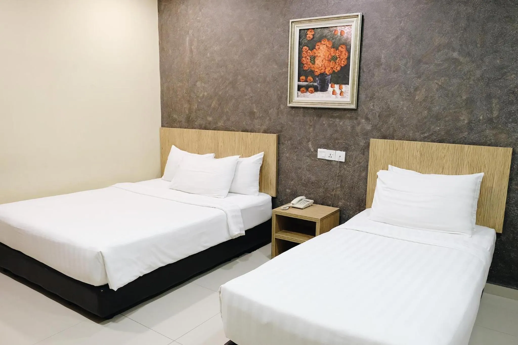 Bed in Era Plus Hotel