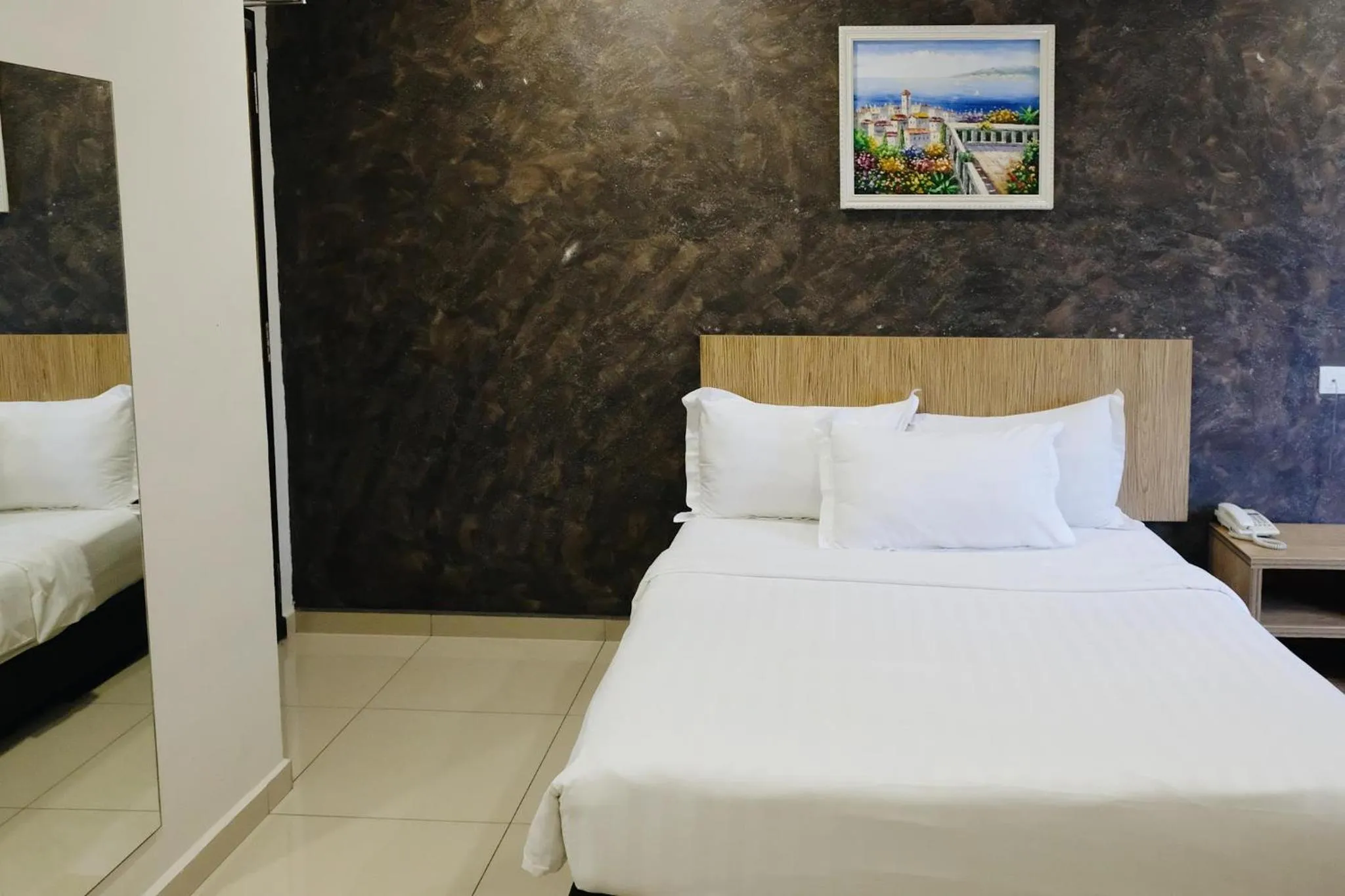 Bed in Era Plus Hotel