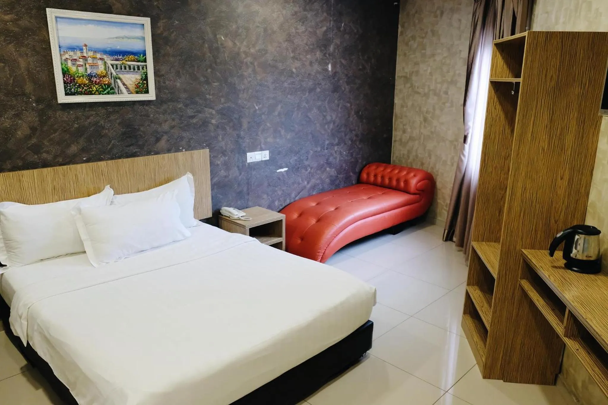 Bed in Era Plus Hotel