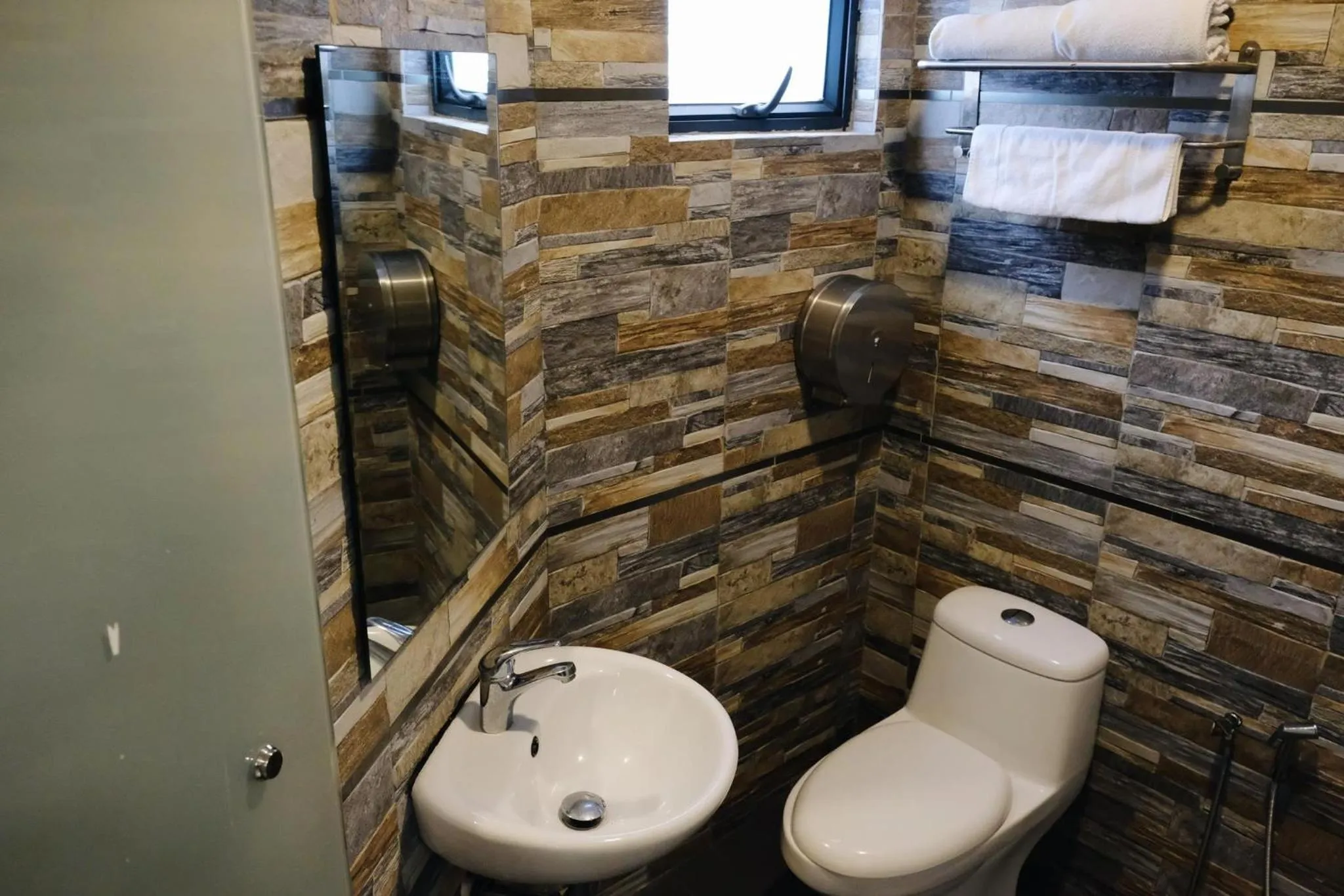 Toilet in Era Plus Hotel