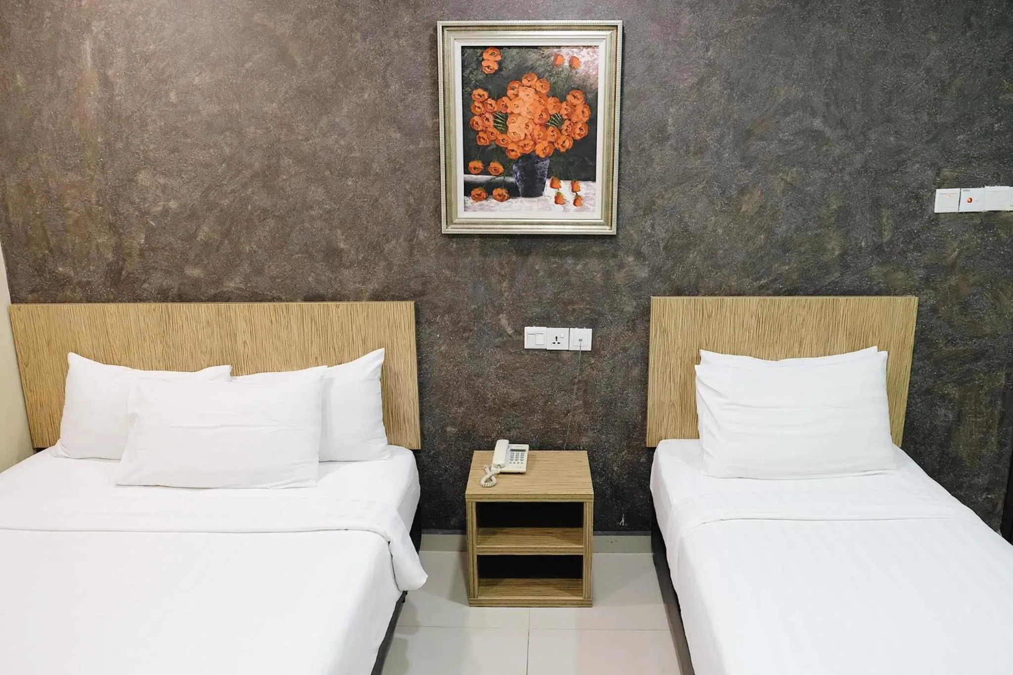 Bed in Era Plus Hotel