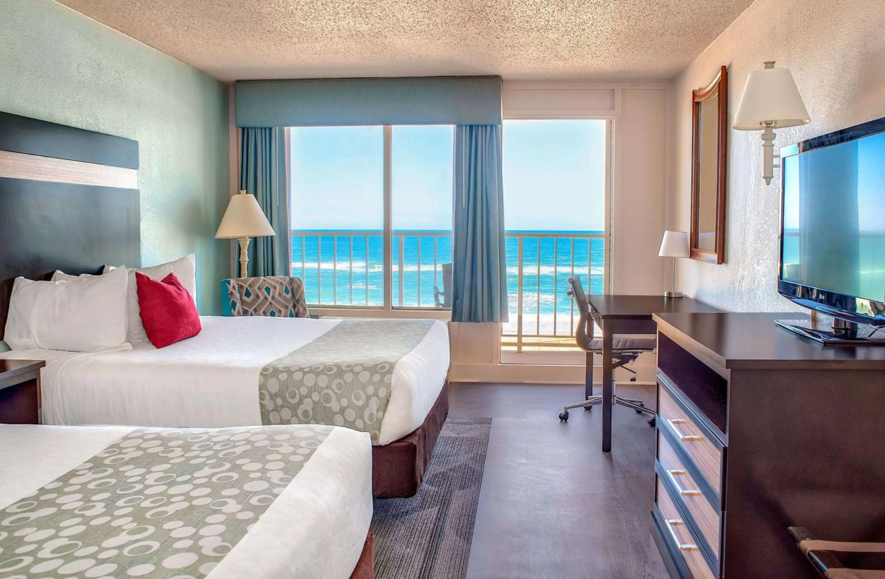 Photo of the whole room, Bed in Ramada Plaza by Wyndham Nags Head Oceanfront