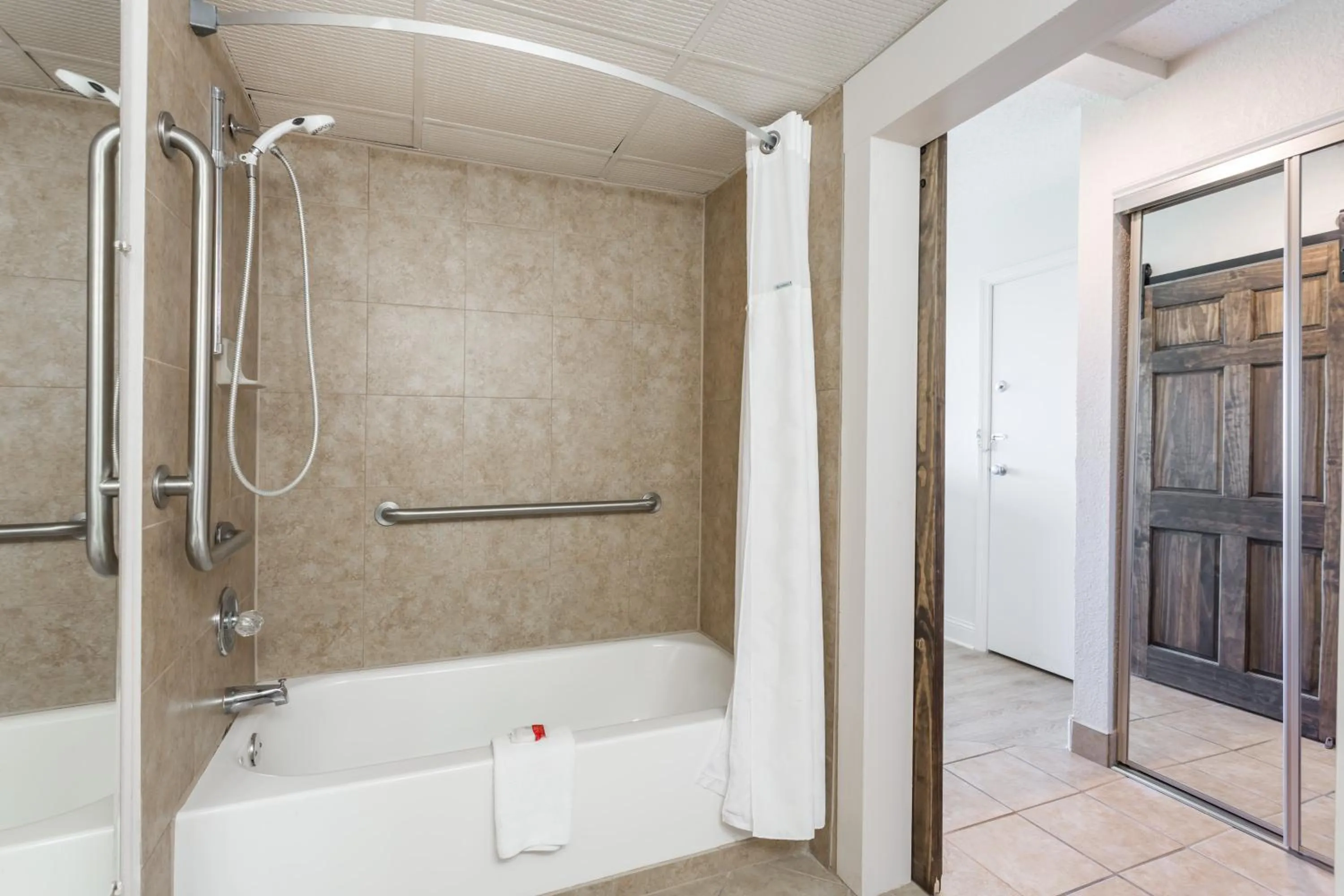 Bathroom in Ramada Plaza by Wyndham Nags Head Oceanfront