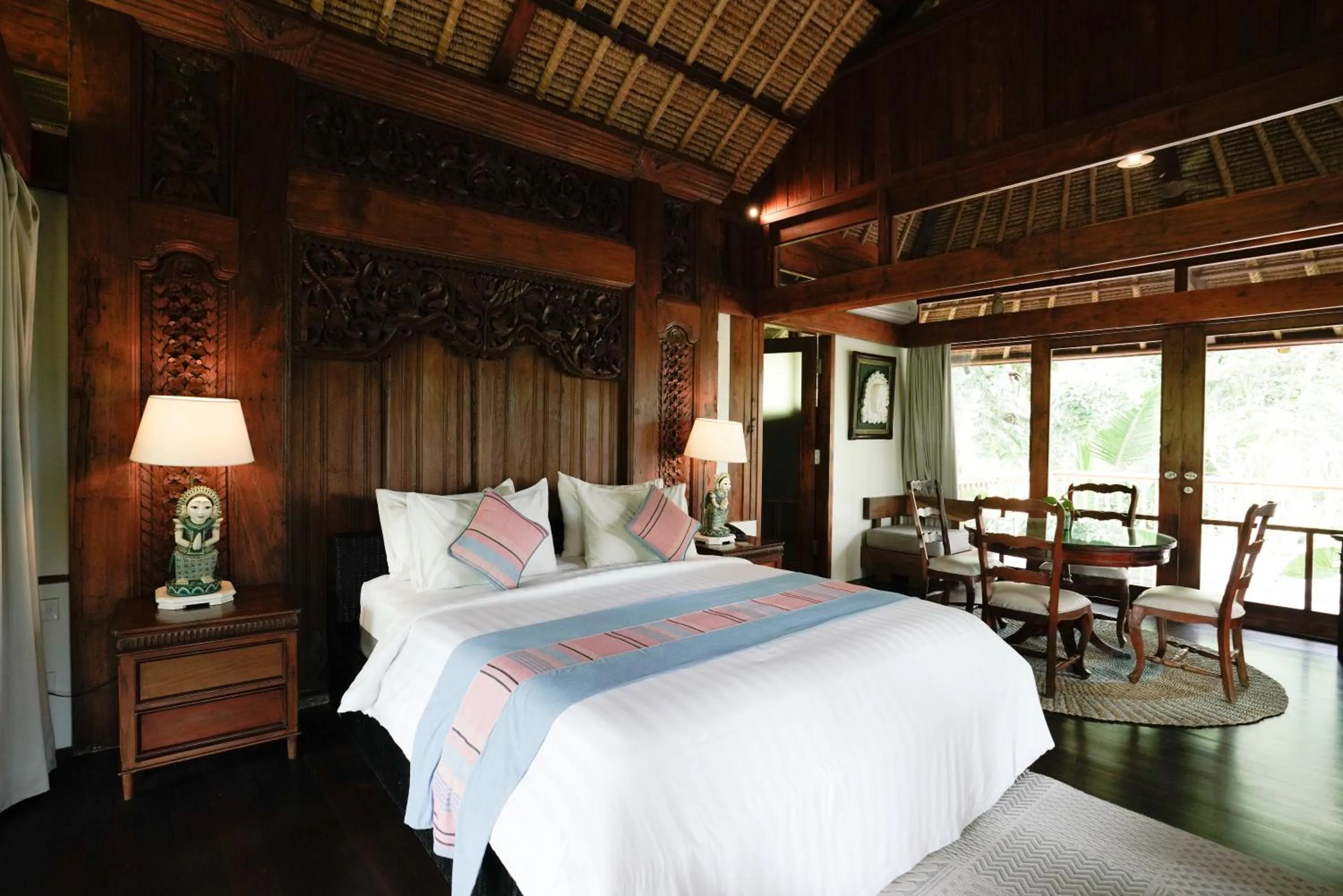 Bed in Umah Lawas Villa Ubud