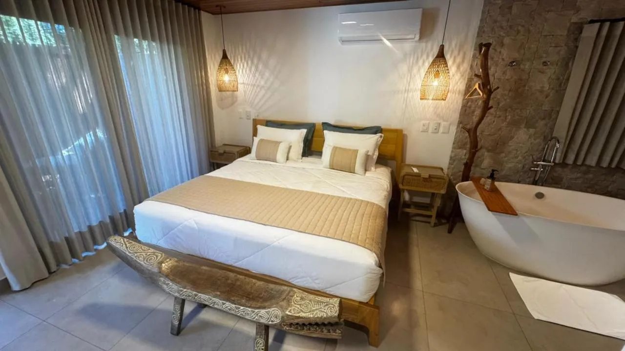 Bed in Pousada Astral da Ilha