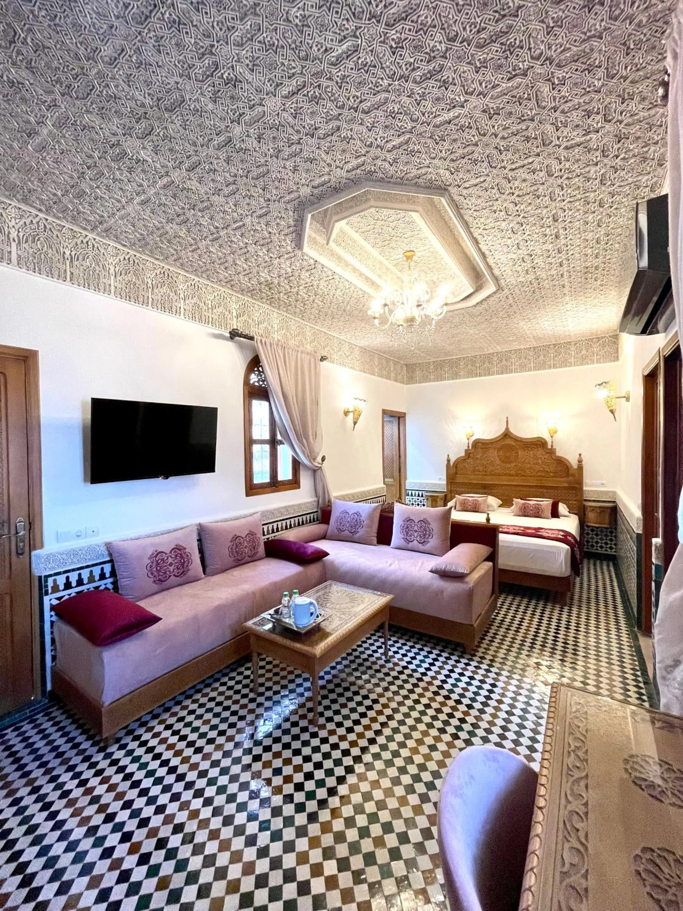 Bed in Le Grand Alcazar - Riad