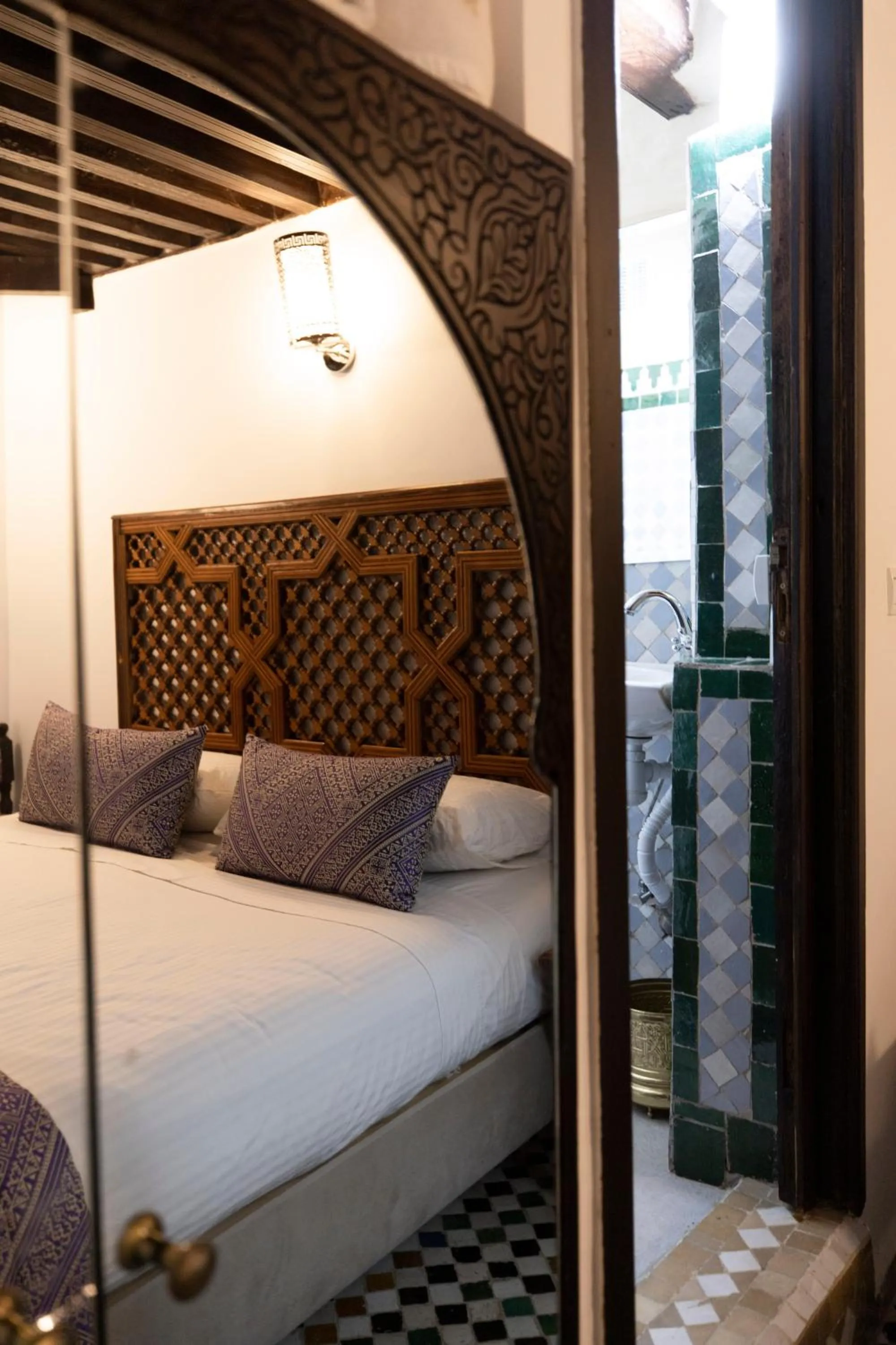 Bed in Le Grand Alcazar - Riad