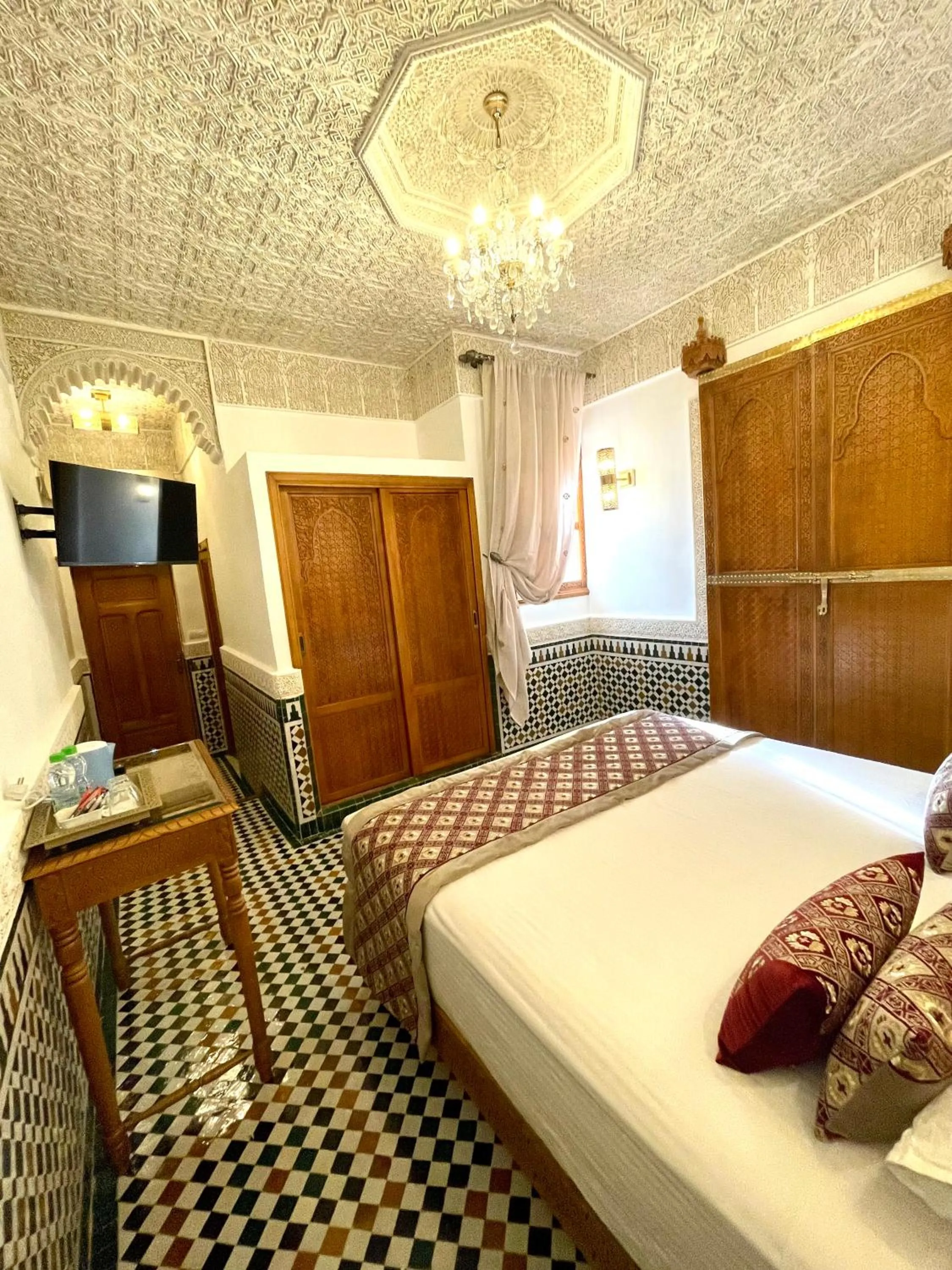 Bed in Le Grand Alcazar - Riad